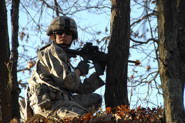 Senior Airman Leigh Downing, fire team member with the 115th Fighter Wing Security Forces establishes a defensive position from which to provide cover fire during a training exercise at Volk Field Combat Readiness Training Center, Wis. Nov. 7, 2009. The Madison, Wis. based 115th Security Forces Squadron engaged in a variety of combat training scenarios as part of their November Unit Training Assembly. (U.S. Air Force photo by Master Sgt. Paul Gorman)
