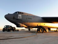 MINOT AIR FORCE BASE, N.D. -- A 23rd Bomb Squadron B-52H Stratofortress is refueled by members of the 5th Logistics Readiness Squadron fuels flight on the mass parking area here Nov. 17. Refueling Minot’s muscle is just one of many mission essential tasks performed by 5th LRS Airmen. (U.S. Air Force photo by Senior Airman Matthew Smith)