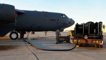 MINOT AIR FORCE BASE, N.D. -- A 23rd Bomb Squadron B-52H Stratofortress is refueled by members of the 5th Logistics Readiness Squadron fuels flight on the mass parking area here Nov. 17. Refueling Minot’s muscle is just one of many mission essential tasks performed by 5th LRS Airmen. (U.S. Air Force photo by Senior Airman Matthew Smith)