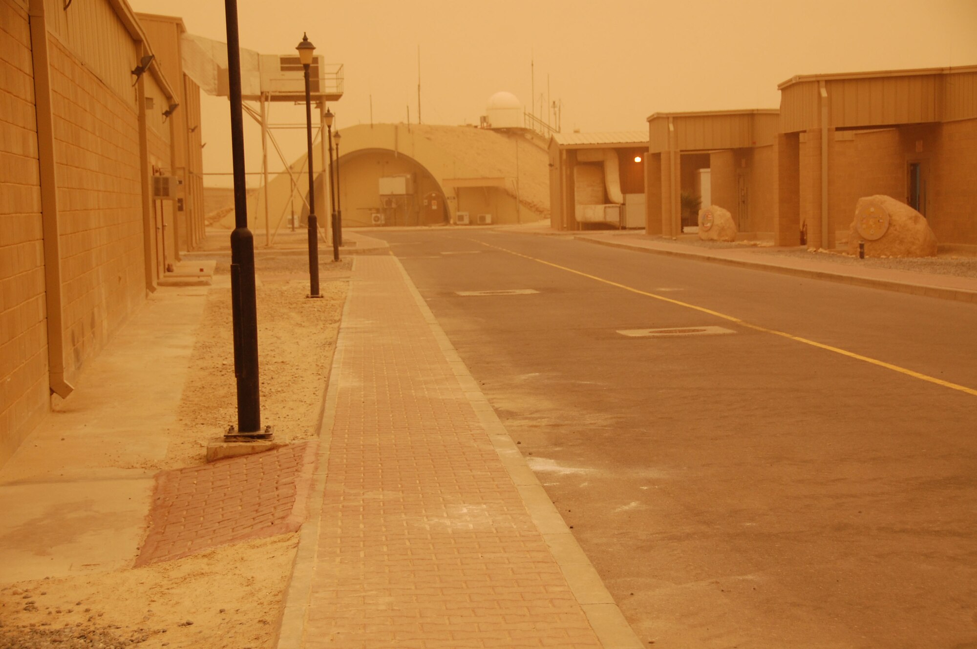 SOUTHWEST ASIA - There was little traffic moving around the streets on base here at the 386th Air Expeditionary Wing as a dust storm passed through the region the afternoon of Nov. 17, 2009 (U.S. Air Force Photo/Capt. Larry van der Oord)