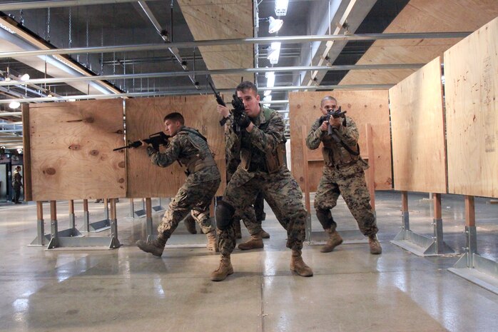 Marines clear a room during a counter-terrorism course at the Indoor Small-Arms Range here Nov. 19. The course was a week long and instructed by former members of the Israeli Task Force. The course was designed for members of the Special Reaction Team but was open to other Marines.