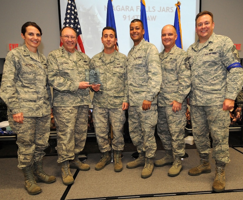 NIAGARA FALLS AIR RESERVE STATION, N.Y. -- The 914th Airlift Wing received first place as the top Get One Now program in the Air Force Reserve.  This award was presented October 22 in Savannah, Georgia during the Air Force Reserve Recruiting Command's field training exercise awards banquet.  Pictured from left to right:  Col. Patricia Jarmuz, 914th Aeromedical Staging Squadron commander; Lt. Gen. Charles Stenner Jr., Commander of Air Force Reserve Command; Senior Master Sgt. Pasquale Muoio, 914th Airlift Wing senior recruiter; Col. Joseph Wilburn, Air Force Reserve Recruiting commander; Chief Master Sgt. Dwight Badgett, Air Force Reserve Command Chief Master Sergeant; Chief Master Sgt. Robert Starkey, Air Force Reserve Recruiting Service Manager.  (U.S. Air Force photo)