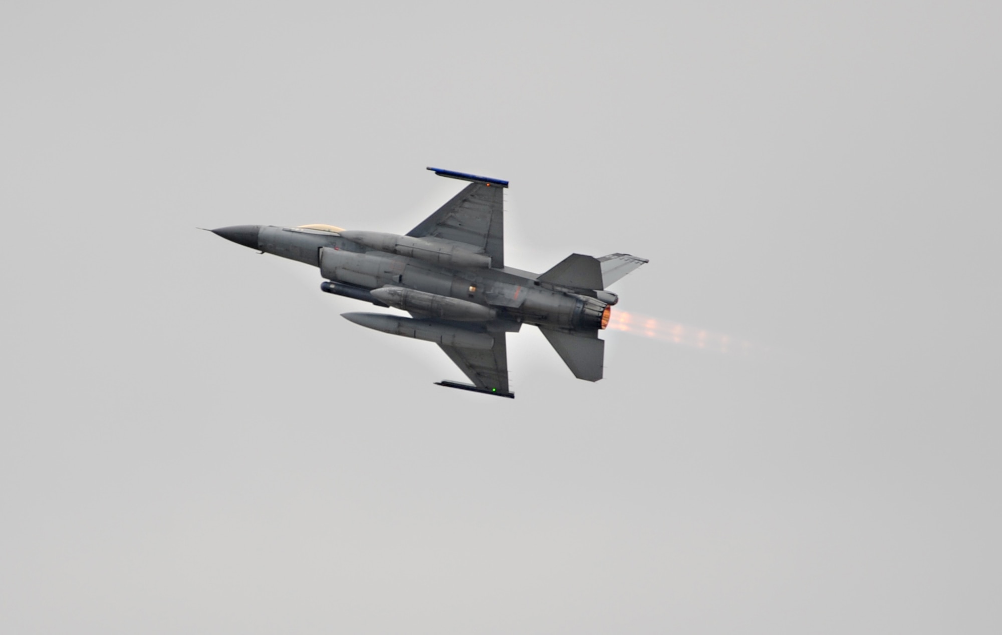Barksdale AFB, La. - An F-16 performs a break-turn in burner during take-off from Barksdale to Fort Polk, La. Nov. 16 during Green Flag East. This exercise gave young pilots an opportunity to see first-hand what it may be like down-range. (U.S. Air Force photo by Senior Airman Alexandra M. Longfellow) (RELEASED)