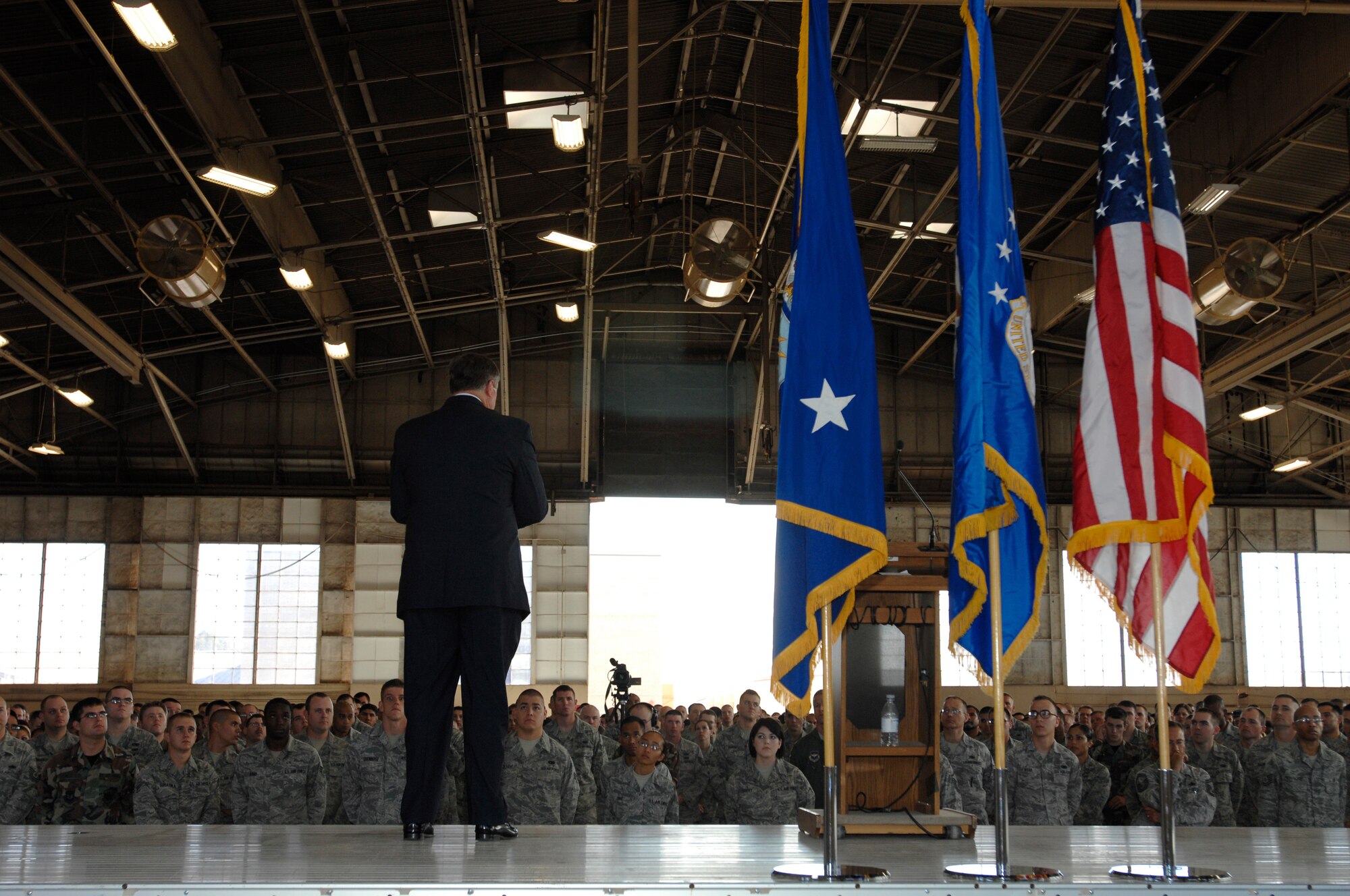 Secretary of the Air Force, Michael B. Donley, addresses members of Luke AFB during an airmans call, Nov. 18. Airmen listen intently as he discusses plans on modernizing fighter aircraft and the impact it will have Air Force-wide. (U.S. Air Force photo by Staff Sgt. Gary Mathieson)