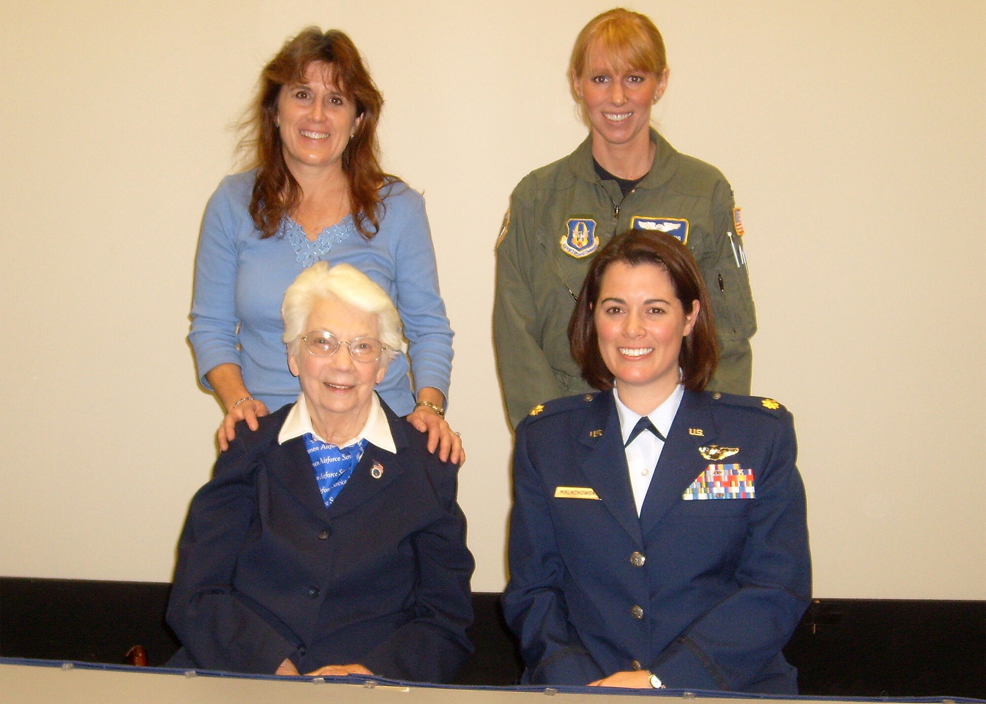 WRIGHT-PATTERSON AIR FORCE BASE, Ohio - (Clockwise from top left) Lt. Col. Kathryn Staiger, 445th Airlift Wing Inspector General’s office; Capt. Jackie Fleming, 89th Airlift Squadron; Maj. Nicole Malachowski, Deputy Chief of Staff at the U.S. General Services Administration; and World War II Women Airforce Service Pilots (WASP) Nadine Nagel. Colonel Staiger and Captain Fleming brought Ms. Nagel to the National Museum of the USAF to listen to Major Malachowski give a lecture on “America’s Women Aviators: from WASP to Thunderbirds, to the Future” Nov. 17.  Major Malachowski was assigned as a demonstration pilot, Thunderbird No. 3/Right Wing, with the U.S. Air Force Air Demonstration Squadron. As the historic first female pilot on any U.S. jet demonstration team, she performed before millions of spectators in 140 air shows across the United States and seven foreign countries. Her lecture was part of the museum's Wings & Things Guest Lecture Series. (U.S. Air Force photo/Ken LaRock)