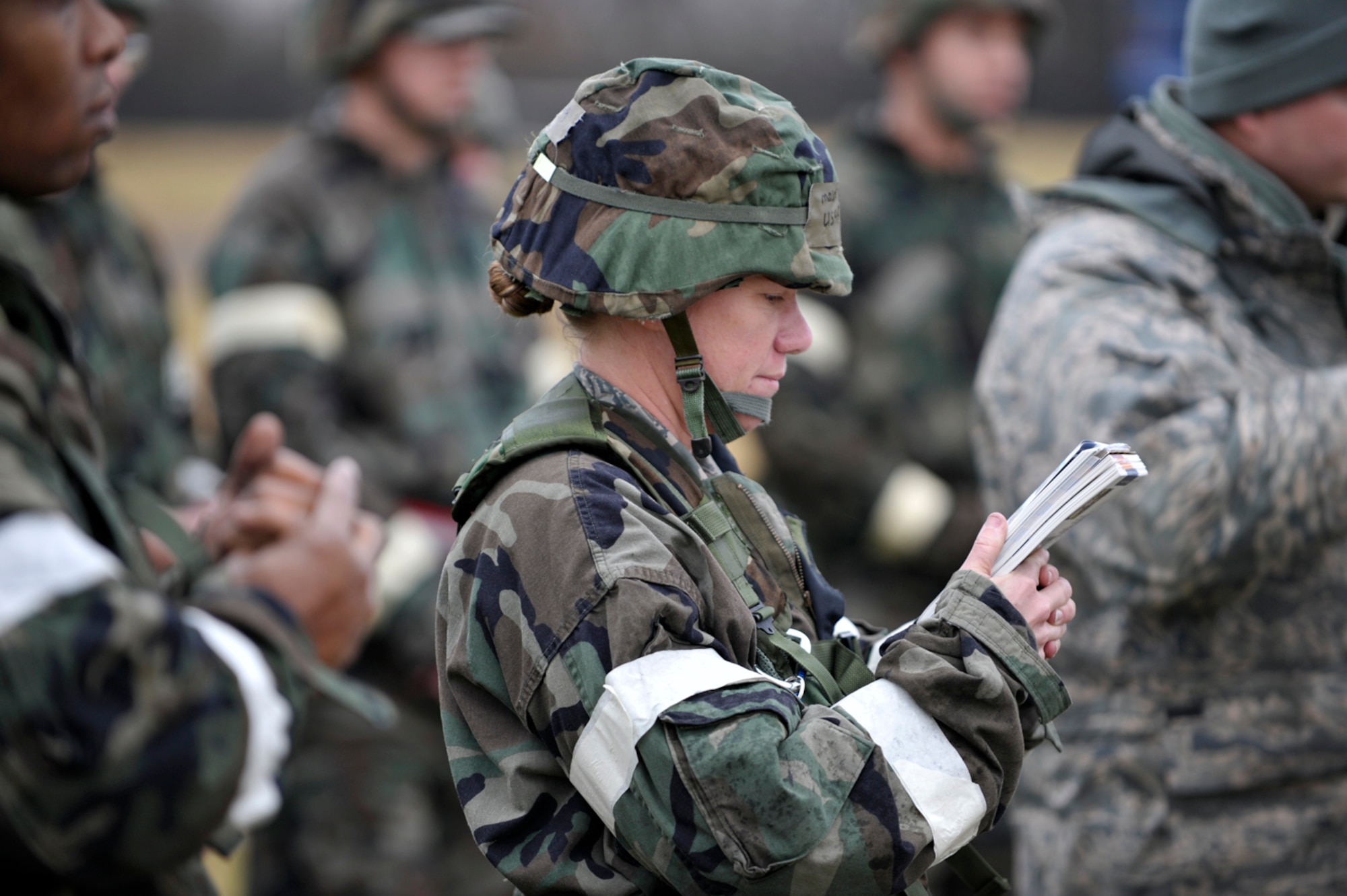 Maj. Erin Manning studies her Airman's Manual during a readiness exercise at McConnell Air Force Base, Kan., on Nov. 15. Major Manning is assigned to the 931st Civil Engineer Squadron, an Air Force Reserve unit at McConnell. (U.S. Air Force photo/Tech. Sgt. Jason Schaap)