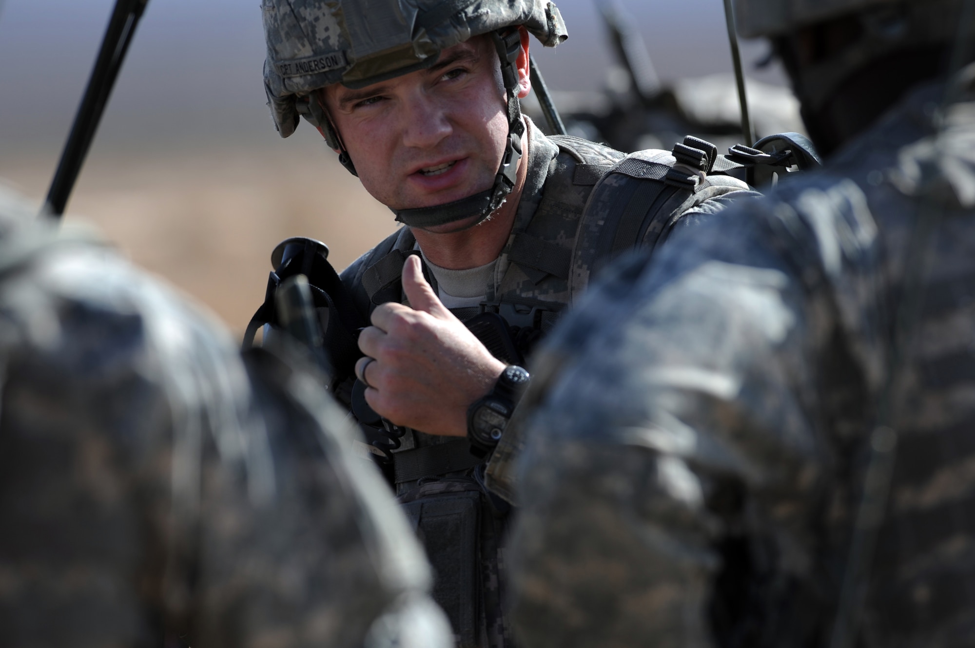 NEVADA TEST AND TRAINING RANGE -- 
Capt. Michael Anderson 173 Calvary Airborne Reconnaissance Squadron, Bravo Troop commander, gives instruction to his squad leaders before moving to the Urban Operations Complex on the NTTR. The Soldiers from the 173rd were airdropped into the NTTR by U.S. Air Force C-17s and C-130s.  The soldiers and aircraft are part of the bi-annual, U.S. Air Force Weapons School Mobility Air Forces Exercise which provides realistic training for combat air force, mobility air force, and U.S. Army personnel.  Approximately 40 C-17s and C-130s from Air Force bases around the United States flew approximately 400 Soldiers from Fort Bragg, N.C., for airdrops on the Nevada Test and Training Range. In addition to providing airdrop training, the exercise also allows Soldiers the opportunity to utilize Range facilities to conduct urban ground operations training.
(U.S. Air Force photo by Tech. Sgt. Michael R. Holzworth)(released)
