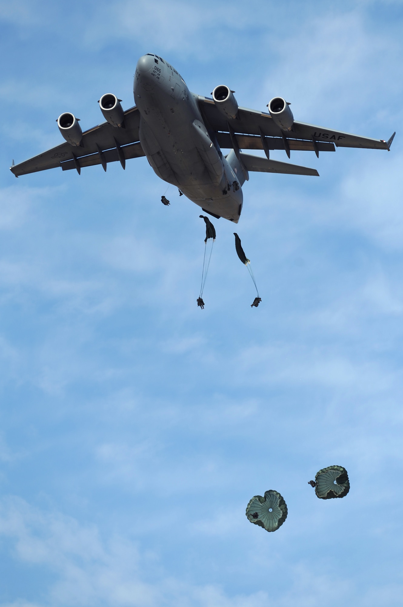 NEVADA TEST AND TRAINING RANGE --
Soldiers from the 173 Calvary Airborne Reconnaissance Squadron, Fort Bragg, N.C., are airdropped into the Urban Operations Complex from a C-17 Globemaster III during a Mobility Air Forces Exercise, Nov. 18. The aircraft and soldiers are part of the bi-annual U.S. Air Force Weapons School MAFEX which provides realistic training for combat air force, mobility air force, and U.S. Army personnel.  Approximately 40 C-17s and C-130s from Air Force bases around the United States flew approximately 400 Soldiers from Fort Bragg, N.C., for airdrops on the Nevada Test and Training Range. In addition to providing airdrop training, the exercise also allows Soldiers the opportunity to utilize Range facilities to conduct urban ground operations training.
(U.S. Air Force photo by Tech. Sgt. Michael R. Holzworth)(Released)