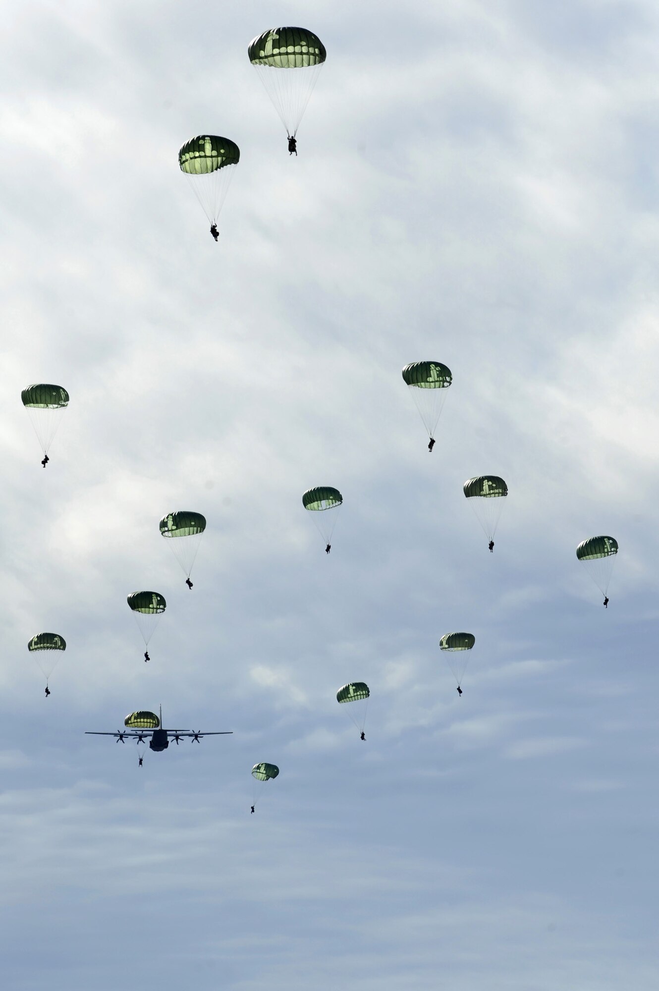 NEVADA TEST AND TRAINING RANGE --
Soldiers from the 173 Calvary Airborne Reconnaissance Squadron, Fort Bragg, N.C., are airdropped into the Urban Operations Complex from a C-130 Hercules during a Mobility Air Forces Exercise, Nov. 18. The aircraft and soldiers are part of the bi-annual U.S. Air Force Weapons School MAFEX which provides realistic training for combat air force, mobility air force, and U.S. Army personnel.  Approximately 40 C-17s and C-130s from Air Force bases around the United States flew approximately 400 Soldiers from Fort Bragg, N.C., for airdrops on the Nevada Test and Training Range. In addition to providing airdrop training, the exercise also allows Soldiers the opportunity to utilize Range facilities to conduct urban ground operations training.
(U.S. Air Force photo by Tech. Sgt. Michael R. Holzworth)(Released)