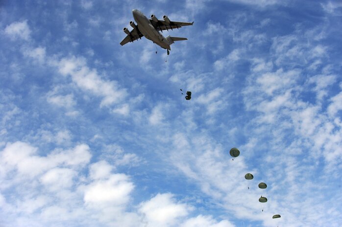 NEVADA TEST AND TRAINING RANGE --
Soldiers from the 173 Calvary Airborne Reconnaissance Squadron, Fort Bragg, N.C., are airdropped into the Urban Operations Complex from a C-17 Globemaster III during a Mobility Air Forces Exercise, Nov. 18. The aircraft and soldiers are part of the bi-annual U.S. Air Force Weapons School MAFEX which provides realistic training for combat air force, mobility air force, and U.S. Army personnel.  Approximately 40 C-17s and C-130s from Air Force bases around the United States flew approximately 400 Soldiers from Fort Bragg, N.C., for airdrops on the Nevada Test and Training Range. In addition to providing airdrop training, the exercise also allows Soldiers the opportunity to utilize Range facilities to conduct urban ground operations training.
(U.S. Air Force Photo / Airman 1st Class Jamie Nicley)(released)
