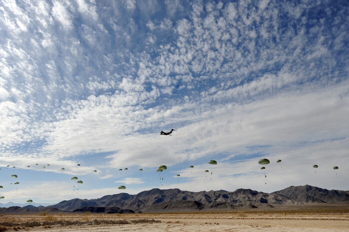 NEVADA TEST AND TRAINING RANGE --
Soldiers from the 173 Calvary Airborne Reconnaissance Squadron, Fort Bragg, N.C., are airdropped into the Urban Operations Complex from a C-17 Globemaster III during a Mobility Air Forces Exercise, Nov. 18. The aircraft and soldiers are part of the bi-annual U.S. Air Force Weapons School MAFEX which provides realistic training for combat air force, mobility air force, and U.S. Army personnel.  Approximately 40 C-17s and C-130s from Air Force bases around the United States flew approximately 400 Soldiers from Fort Bragg, N.C., for airdrops on the Nevada Test and Training Range. In addition to providing airdrop training, the exercise also allows Soldiers the opportunity to utilize Range facilities to conduct urban ground operations training.
(U.S. Air Force Photo / Airman 1st Class Jamie Nicley)(released)
