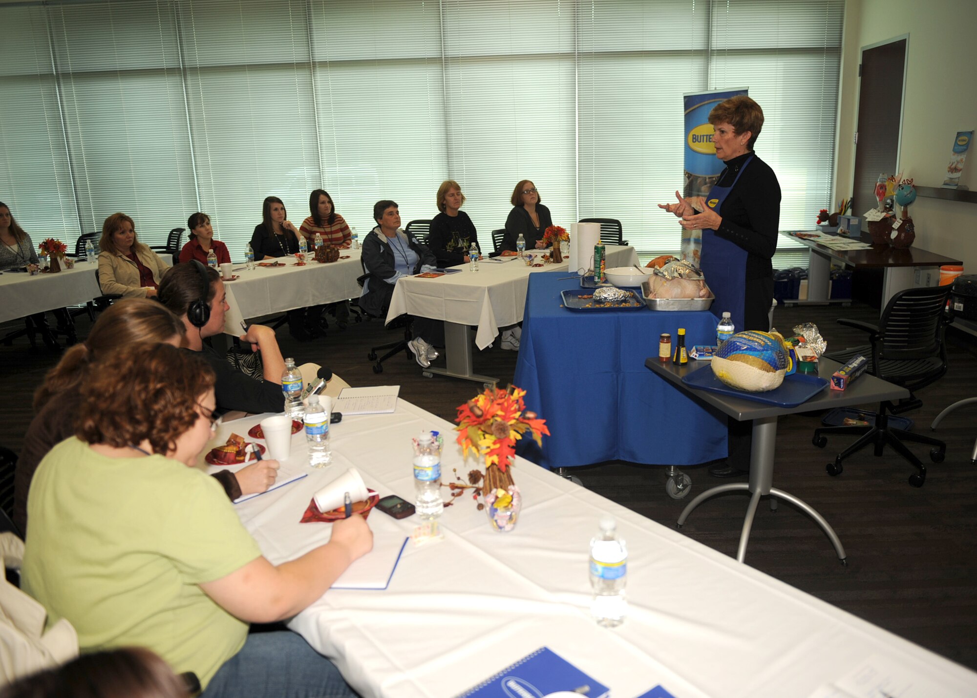 Mary Clingman, director of Butterball's Turkey-Talk Line, speaks to military spouses from Seymour Johnson Air Force Base, N.C. and Fort Bragg, N.C., about how to cook turkeys, what temperatures to use and food safety at Butterball University Nov. 17, 2009. Butterball University,located in Garner, N.C., offers  information on how to prepare turkeys and the history of the Turkey-Talk Line. (U.S. Air Force photo/Senior Airman Ciara Wymbs)