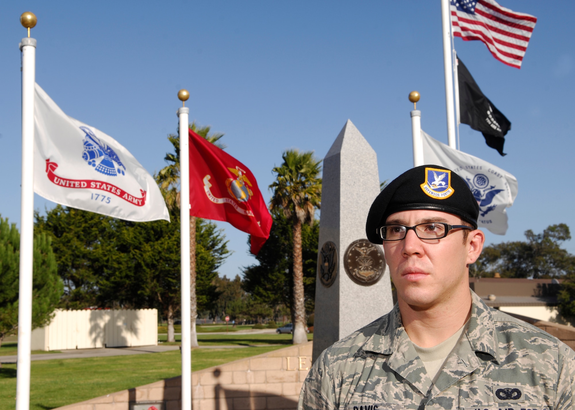 VANDENBERG AIR FORCE BASE, Calif. -- Awaiting his turn to read during the POW/MIA vigil, Airman Matthew Davis, a 30th Security Forces Squadron entry controller, stands at parade rest here Friday, Nov. 13, 2009. More than 100 Airmen read the names of servicemembers who were prisoners of war or ,issing in action. (U.S. Air Force photo/Airman 1st Class Heather R. Shaw)







