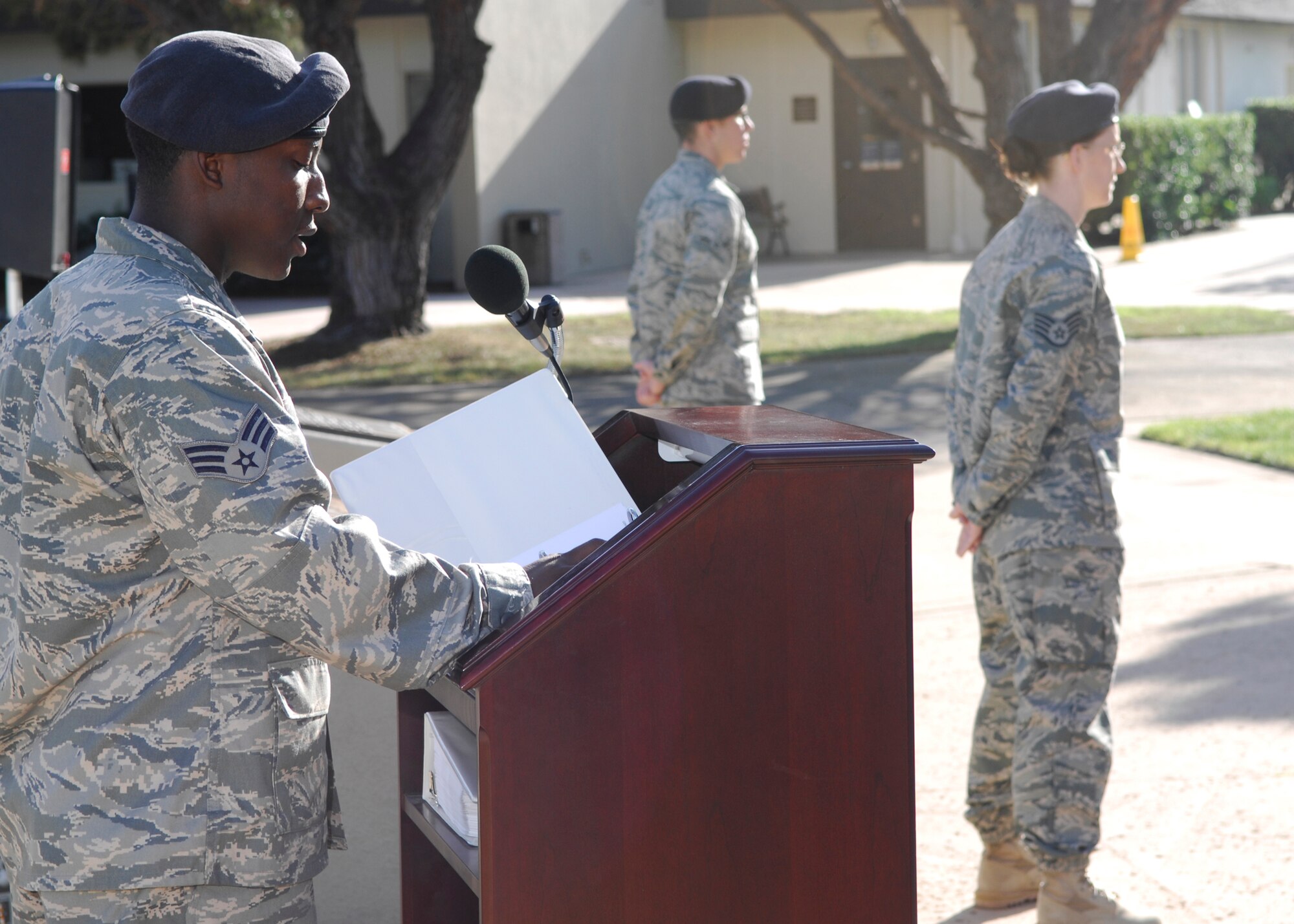 VANDENBERG AIR FORCE BASE, Calif. -- Honoring those servicemembers who were prisoners of war or missing in action, Senior Airman Cordarius Lewis, a patrolman from the 30th Security Forces Squadron, reads from the list of names during a vigil held here Friday, Nov. 13, 2009. Members of Team V took turns reading the names for 24 hours, commencing after a ceremony held here the following day. (U.S. Air Force photo/Airman 1st Class Heather R. Shaw)





