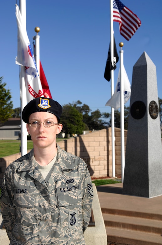 VANDENBERG AIR FORCE BASE, Calif. -- Somberly awaiting her turn to read during the POW/MIA vigil, Staff Sgt. Jennifer Lewis, a patrolman from the 30th Security Forces Squadron, stands at parade rest here Friday, Nov. 13, 2009. More than 100 Airmen read the names of servicemembers who were prisoners of war or missing in action. (U.S. Air Force photo/Airman 1st Class Heather R. Shaw)

