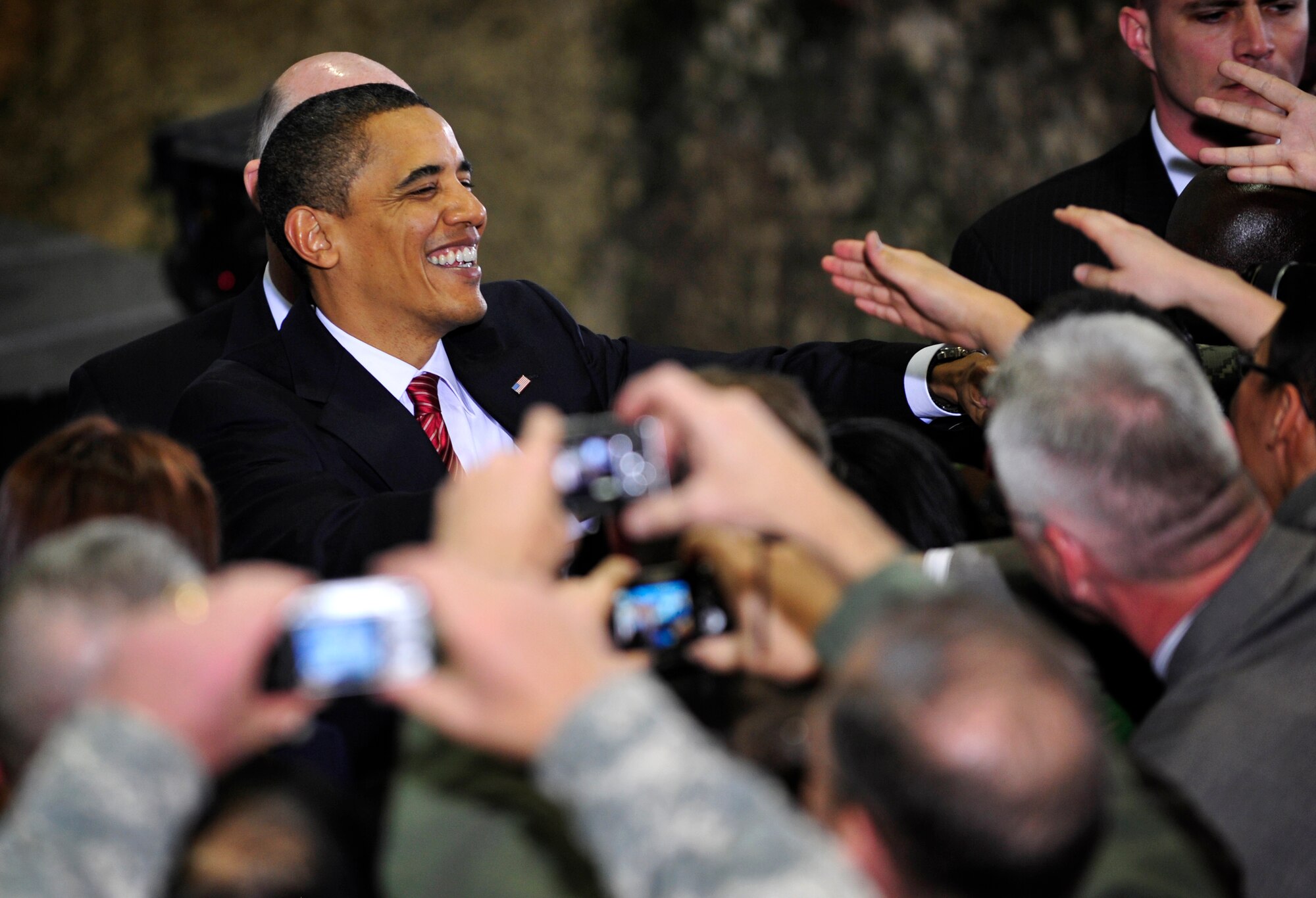 President Barack Obama shakes hands with U.S. servicemembers Nov. 18, 2009, at Osan Air Base, South Korea. This is President Obama's first visit to South Korea since taking office in January. (U.S. Air Force photo/Staff Sgt. Brian Ferguson)

