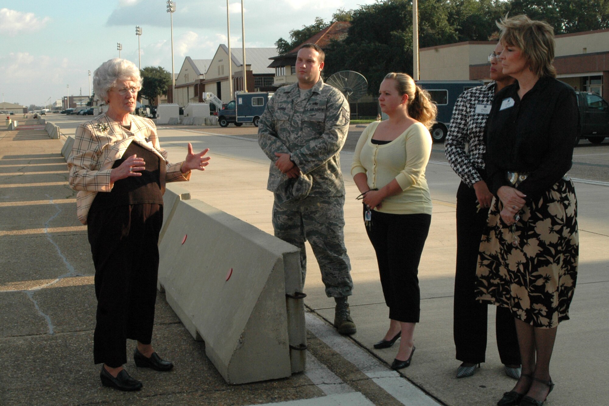 Maggie Bonner, a protocol representative for Headquarters Air Force Services Agency, instructs a protocol class on the proper procedure when meeting and greeting a distinguished visitor on the flight line. Ms. Bonner was part of a teaching team, instructing a five-day protocol workshop from November 9, 2009 through November 13, 2009 in the 917th Wing auditorium on Barksdale Air Force Base, La., teaching the students proper etiquette and procedures for meeting, escorting and interacting with high ranking personnel, elected officials, and local community leaders (U.S. Air Force photo/Airman 1st Class Crystal Jordan)