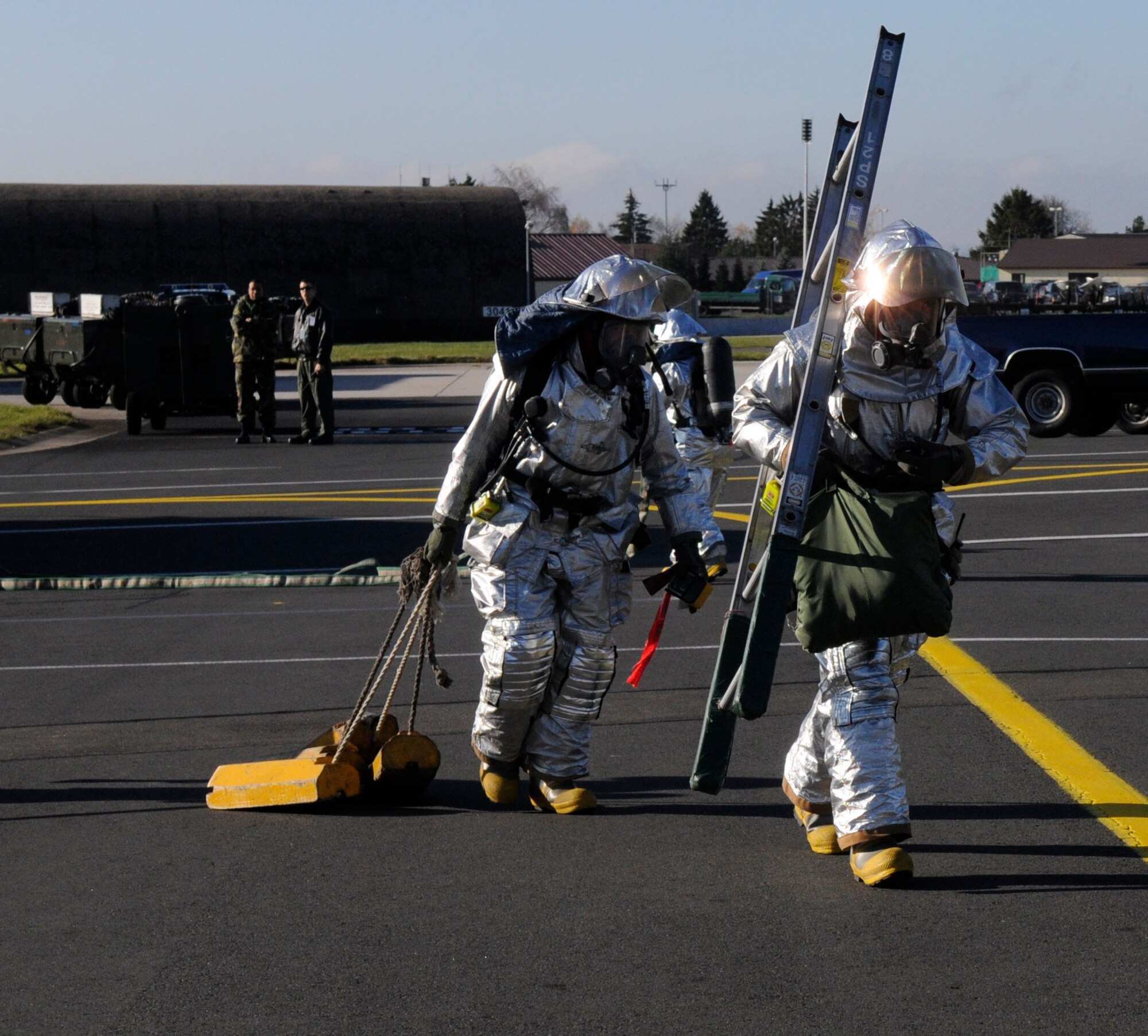 SPANGDAHLEM AIR BASE, Germany – Firefighters from the 52nd Civil Engineer Squadron respond to a simulated hydrazine spill during a hydrazine response exercise Nov 19. Hydrazine fuels the emergency power unit of an F-16 Fighting Falcon in the event the aircraft loses hydraulic, electrical or engine power in flight. (U.S. Air Force photo/Airman 1st Class Staci Miller)
