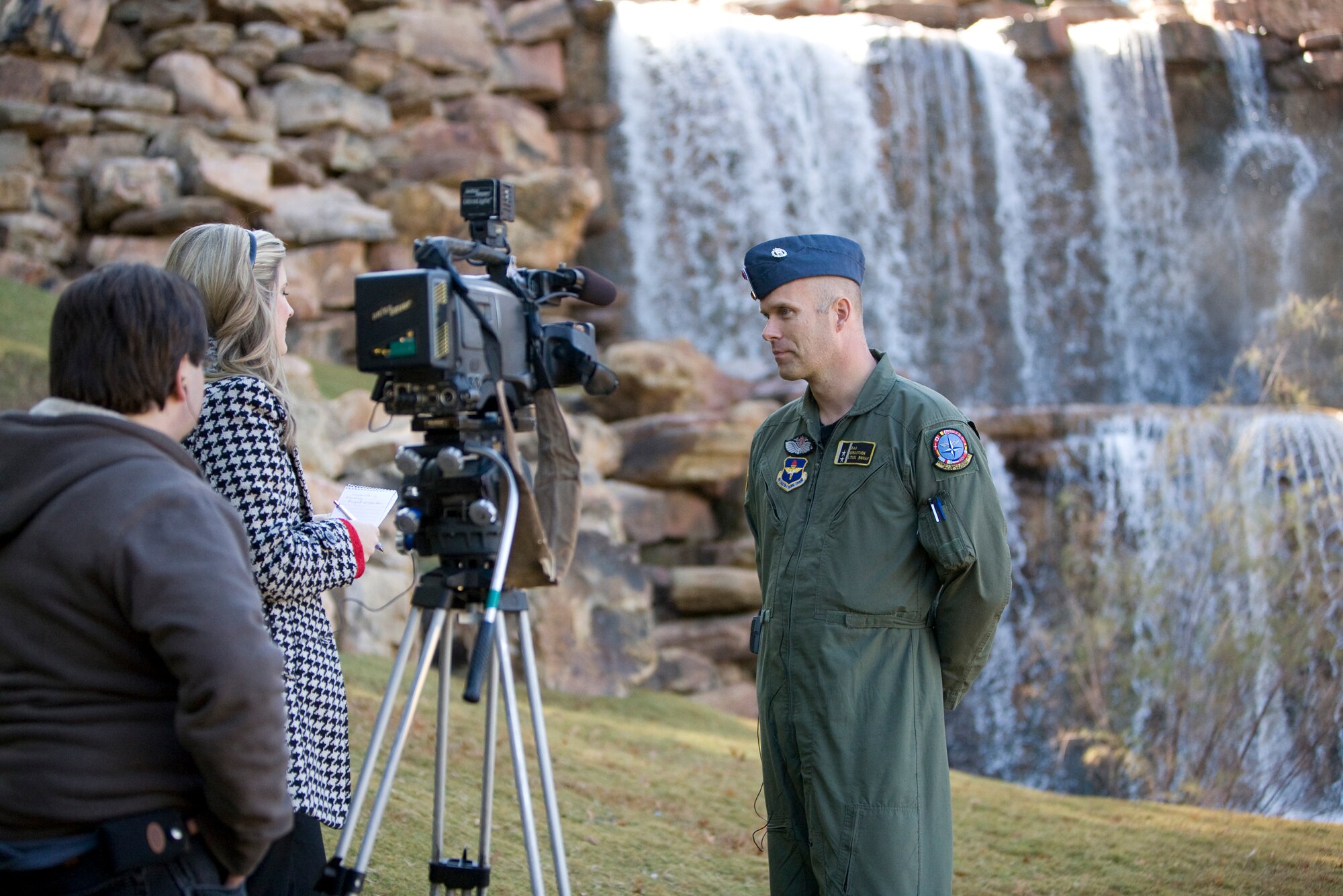 Lt. Col. Dag Simastuen, the senior national representative for the Norwegian air force at the Euro-NATO Joint Jet Pilot Training Program at Sheppard, answers questions Nov. 18 during an interview with KAUZ News Channel 6 reporter Lindsey Rogers about the country's participation in the multi-national pilot training organization. In addition to Norway's participation in the program, they discussed the multiple roles members of the ENJJPT international community play here in Wichita Falls from Junior League volunteers to teaching in the local schools. The segment will air Nov. 19. (U.S. Air Force photo/Lt. Col. Ternell Washington)