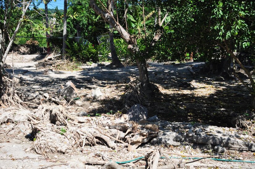 ILOPANGO, El Salvador - A photo of some of the damage Nov. 17 near the small village of El Sauce, El Salvador. A Civil Affairs team from Special Operations Command South, based out of Homestead, Florida, provided vital aid to the small village of El Sauce by dropping off more than 5,000 total pounds of food and water Nov. 17 and 18. The area was so badly damaged by the floods that villagers had to hand-carry the 5,000 pounds of food and water almost a quarter of a mile back to the village (U.S. Air Force photo/Staff Sgt. Chad Thompson).