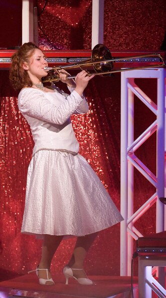 Senior Airman Victoria Howard, Tops In Blue musician, plays the trombone during the Tops In Blue show Nov. 17 in the Delaware State University Education and Humanities Center. The U.S. Air Force's premiere performing group entertained the full house with their show titled 'To Dream.'  (U.S. Air Force photo/Jason Minto)