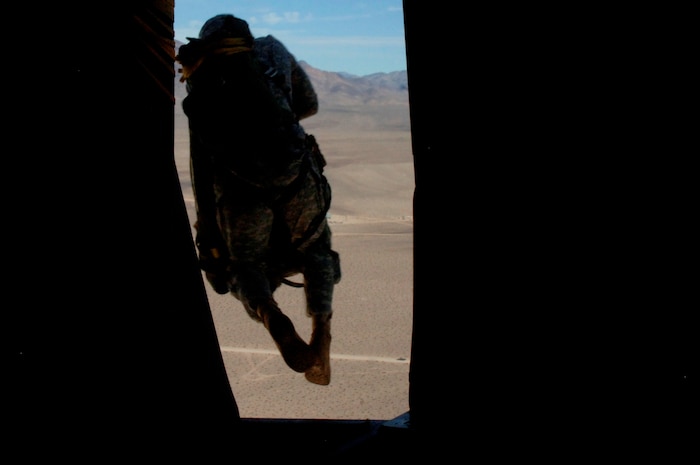 A Soldier with the 82nd Airborne Division at Fort Bragg, N.C., jumps out of a Charleston C-17 during the Mobility Air Forces Exercise Nov. 18. More than 40 mobility aircraft and 400 soldiers from the 82 AD participated in the exercise to provide realistic training for mobility air forces and Army partners for both ongoing operations and future contingencies. (U.S. Air Force photo/Staff Sgt. Marie Brown)