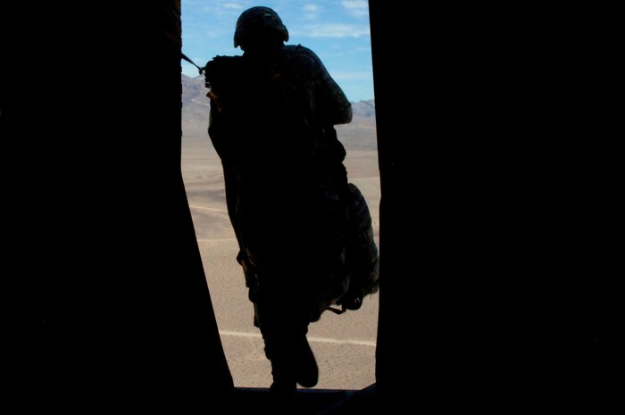 A Soldier with the 82nd Airborne Division out of Fort Bragg, N.C., prepares to jump out of a Charleston C-17 during the Mobility Air Forces Exercise Nov. 18. More than 40 mobility aircraft and 400 soldiers from the 82 AD participated in the exercise to provide realistic training for mobility air forces and Army partners for both ongoing operations and future contingencies. (U.S. Air Force photo/Staff Sgt. Marie Brown)