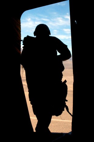 A Soldier with the 82nd Airborne Division out of Fort Bragg, N.C., prepares to jump out of a Charleston C-17 during the Mobility Air Forces Exercise Nov. 18. More than 40 mobility aircraft and 400 soldiers from the 82 AD participated in the exercise to provide realistic training for mobility air forces and Army partners for both ongoing operations and future contingencies. (U.S. Air Force photo/Staff Sgt. Marie Brown)