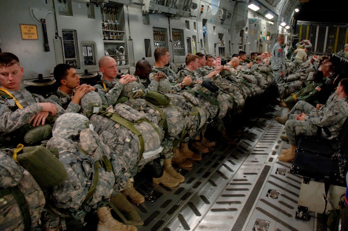 Soldiers with the 82nd Airborne Division from Fort Bragg, N.C., wait aboard a Charleston AFB C-17 for execution of an aerial jump during the Mobility Air Forces Exercise Nov. 18. More than 47 various units and 40 mobility aircraft participated in MAFEX  to execute a Joint Forcible Entry Airborne Assault operation integrating a variety of national assets from across the U.S. (U.S. Air Force photo/Staff Sgt. Marie Brown)