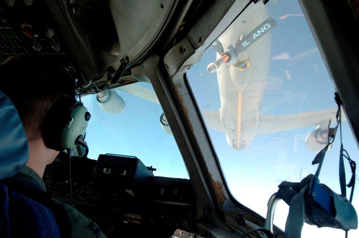 A KC-135 with the Illinois Air National Guard performs an in-flight refuel on a Charleston AFB C-17 during the Mobility Air Forces Exercise Nov. 18. More than 40 mobility aircraft were planned for participation in the event and included 10 KC-135 tankers which were responsible for providing fuel to aircraft traveling to the Nevada desert from across the U.S. to participate in the exercise. (U.S. Air Force photo/Staff Sgt. Marie Brown)