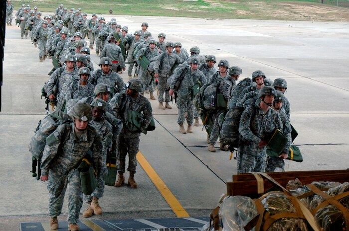 Soldiers with the 82nd Airborne Division out of Fort Bragg, N.C., board a Charleston AFB C-17 at Pope AFB, N.C., in preparation for an aerial jump during the Mobility Air Forces Exercise Nov. 18. MAFEX is planned by students enrolled in the Air Force Weapons School at Nellis AFB, Nev., and was executed by active-duty, Reserve and Guard Airmen from across the U.S. in coordination with Army partners. (U.S. Air Force photo/Staff Sgt. Marie Brown)