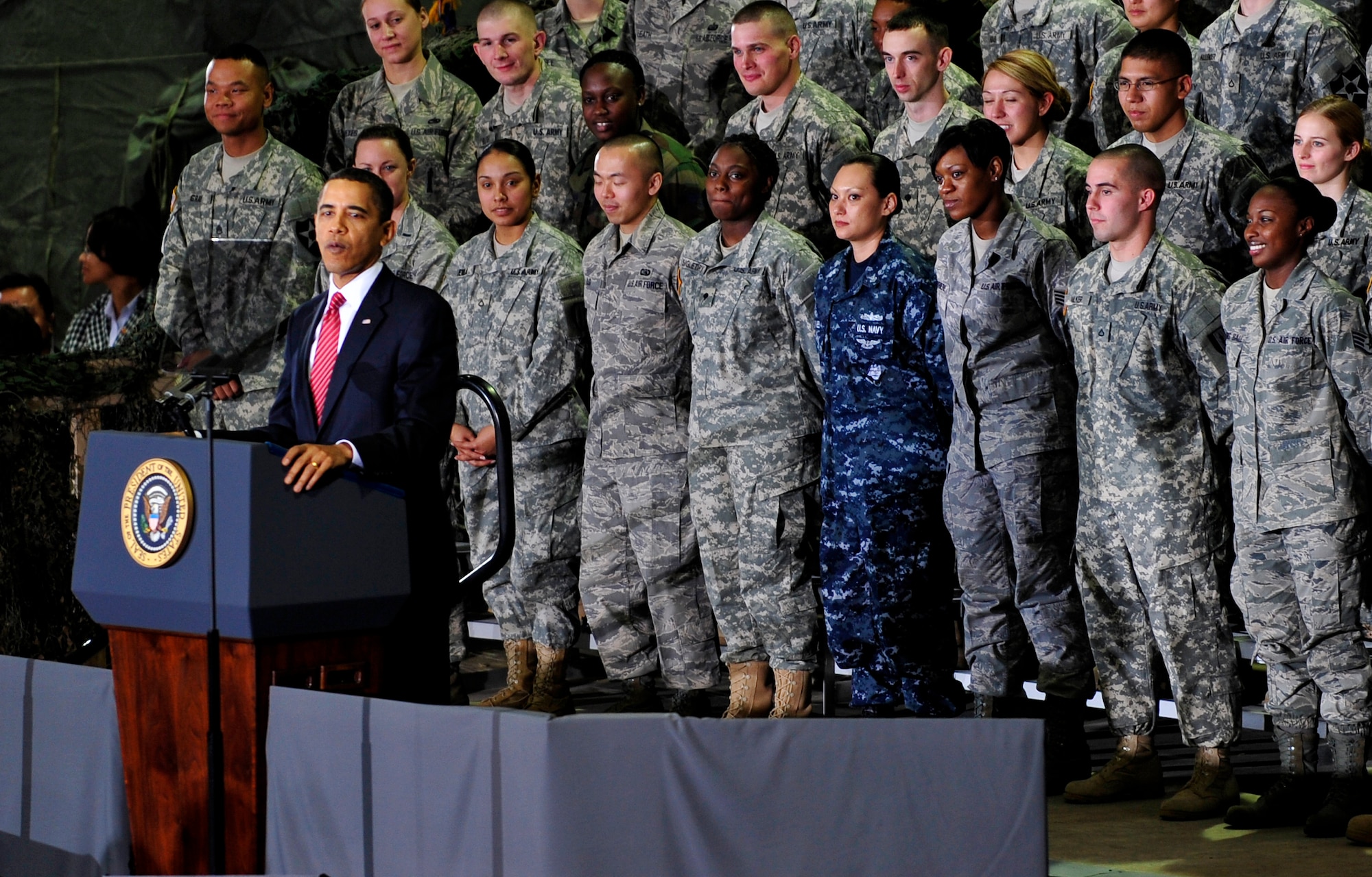 U.S. President Barack Obama addresses more than 1,500 U.S. servicemembers at Osan Air Base, Republic of Korea, Nov. 19, 2009.  This is President Obama's first visit to Korea since taking office in January.  The stop in Korea was the last leg of his Asia visit. (U.S. Air Force photo/Staff Sgt. Brian Ferguson)

