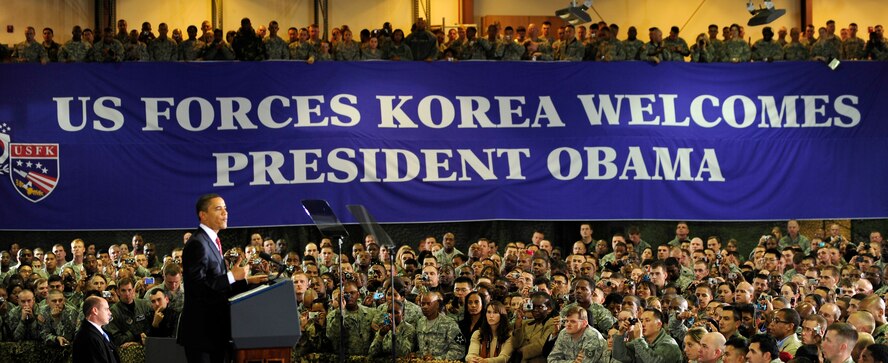 U.S. President Barack Obama addresses more than 1,500 U.S. servicemembers at Osan Air Base, Republic of Korea, Nov. 19, 2009.  This is President Obama's first visit to Korea since taking office in January.  The stop in Korea was the last leg of his Asia visit. (U.S. Air Force photo/Staff Sgt. Brian Ferguson)

