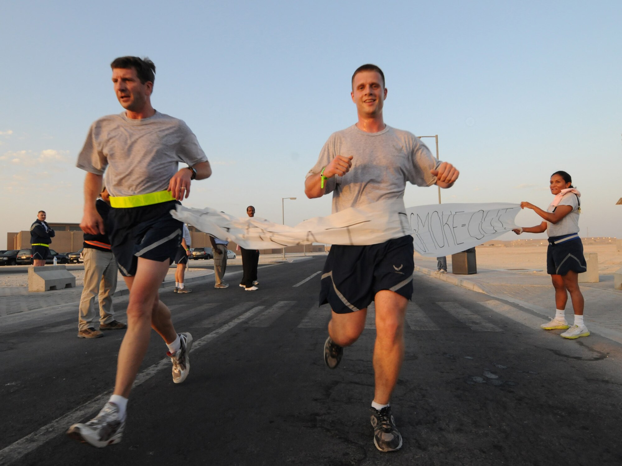 Deployed servicemembers participate in a 5K run as part of the Great Desert Smoke-Out in Southwest Asia, Nov. 19, 2009. The Great Desert Smoke-Out, inspired by the Great American Smoke-Out, encourages deployed personnel to stop smoking for one day with the goal of quitting permanently.
(U.S. Air Force Photo/Tech. Sgt. Jason W. Edwards)
