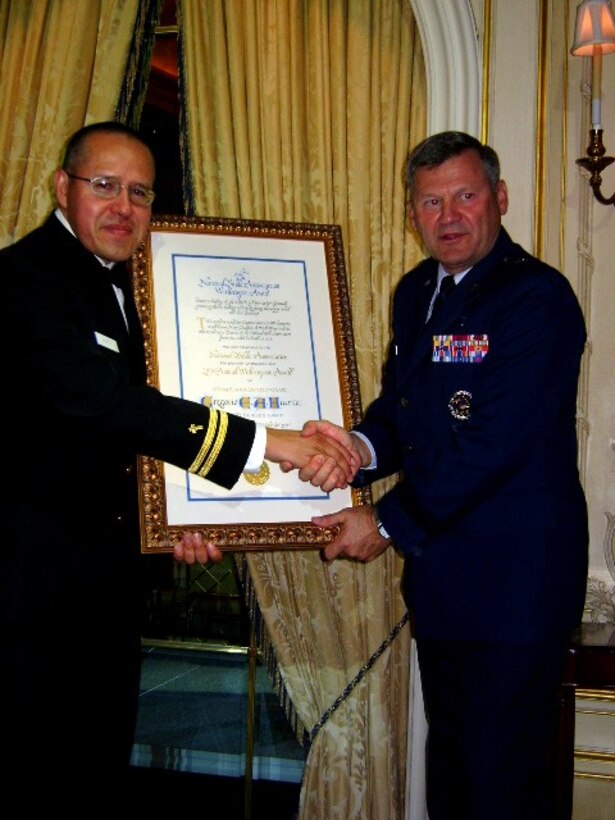(Left) Navy Lt. Gregorio Huerta, chaplain, Marine Corps Base Camp Pendleton School of Infantry West, receives the 2009 Witherspoon Chaplains’ Award from Brig. Gen. David Cyr, Air Force Deputy Chief of Chaplains, at a ceremony held during the annual National Bible Week Gala Dinner in New York, Nov. 19. The award is given to one outstanding military chaplain from each branch of the Armed Services who not only has a deep personal commitment to Bible reading, but whose actions and day-to-day activities encourage others to read, study and apply the Bible’s principles.