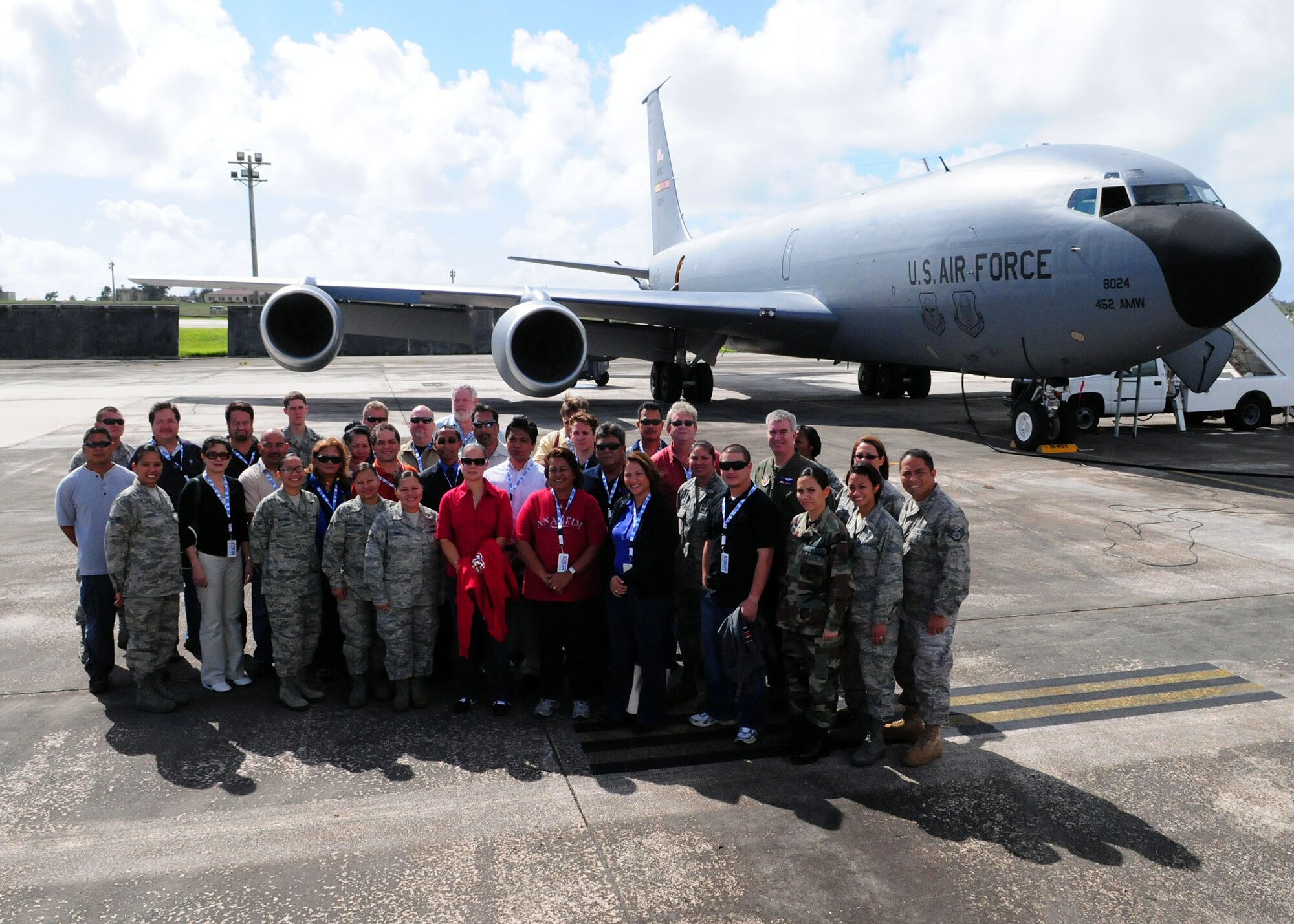 ANDERSEN AIR FORCE BASE, Guam - Guam local business leaders, Reservists, and Guardsmen stop and pose for a group photo before boarding the KC-135 at Andersen AFB, Nov. 13 during the 624th Regional Support Group Employer Support Flight. While aboard the training mission, the group received an up-close view of the tanker refueling a B-52 Stratofortress over the waters of the Pacific Ocean. The event marked an outreach effort by the 624th Regional Support Group, the largest Air Force Reserve presence in the Pacific, to educate the Reservists' civilian employers on what these citizen airmen do when fulfilling their Air Force Reserve duties. (U.S. Air Force photo by Airman 1st Class Courtney Witt)