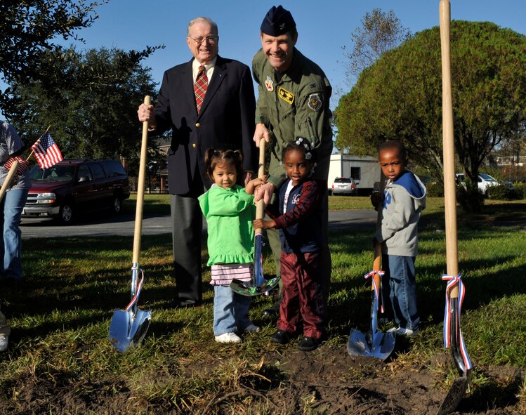 MOODY AIR FORCE BASE, Ga. -- Col. Gary Henderson, 23rd Wing commander, along with children from the Child Development Center, participate in the ground breaking ceremony for the new CDC facility here Nov 20. Estimated completion date for the new facility is scheduled for March 2011. The $10 million American Recovery and Reinvestment Act funded facility will accommodate 276 children, which will immediately satisfy Moody’s 160 child waiting list. (U.S. Air Force photo by Senior Airman Schelli Jones)
