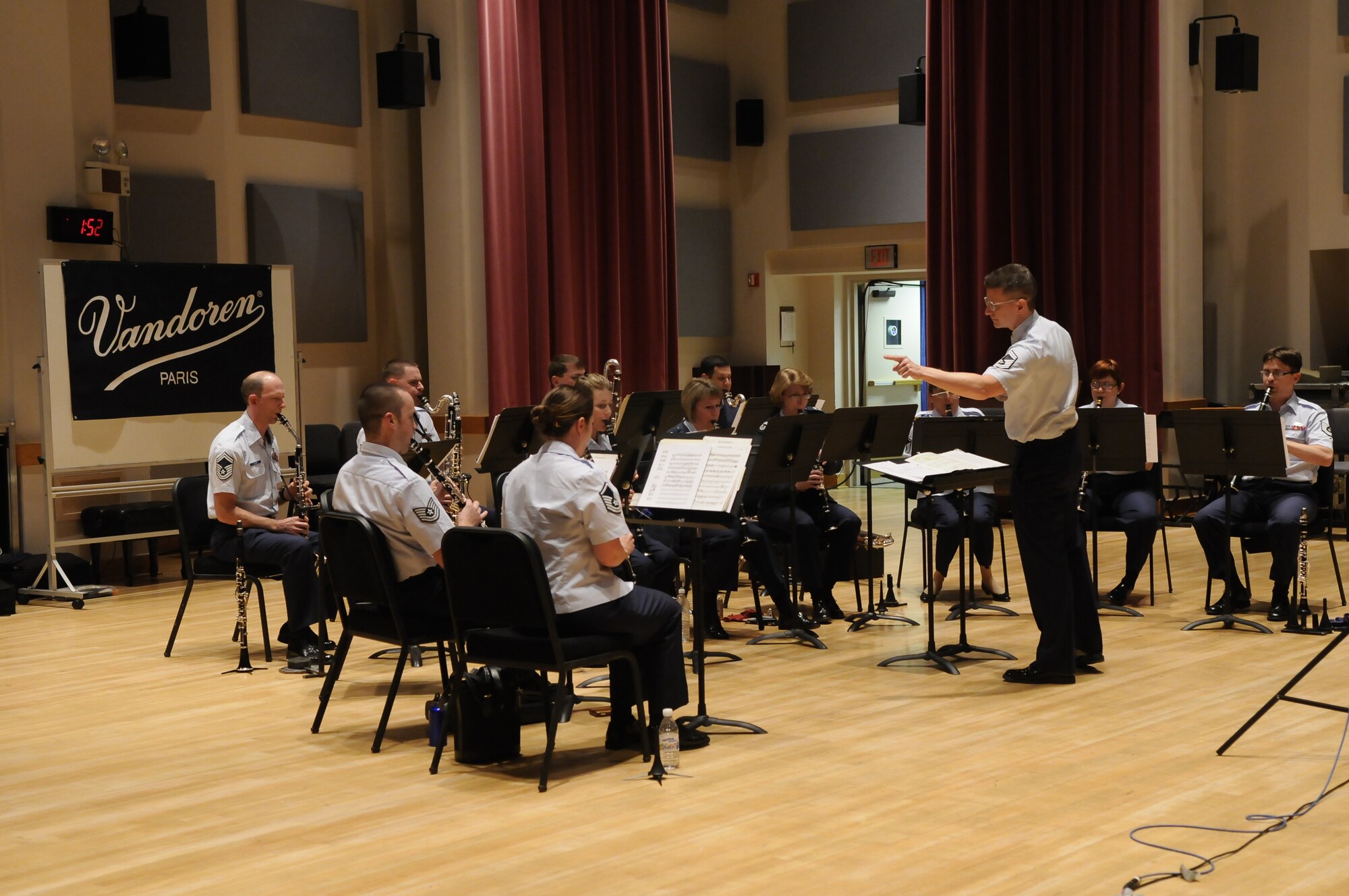 Master Sgt. Carl Long conducts the clarinet section of the Concert Band during the Clarinet Ensemble Festival.  This event brought clarinet ensembles from around the nation together for a weekend of performances and panel discussions. The festival featured many service band ensembles, including clarinet quartets and trios from the U.S. Navy, Marine, and Army Bands.  The event culminated on Sunday, November 8, with a performance by The USAF Band Clarinet Quartet and Clarinet Choir. (U.S. Air Force photo by Senior Airman Alexandre Montes)