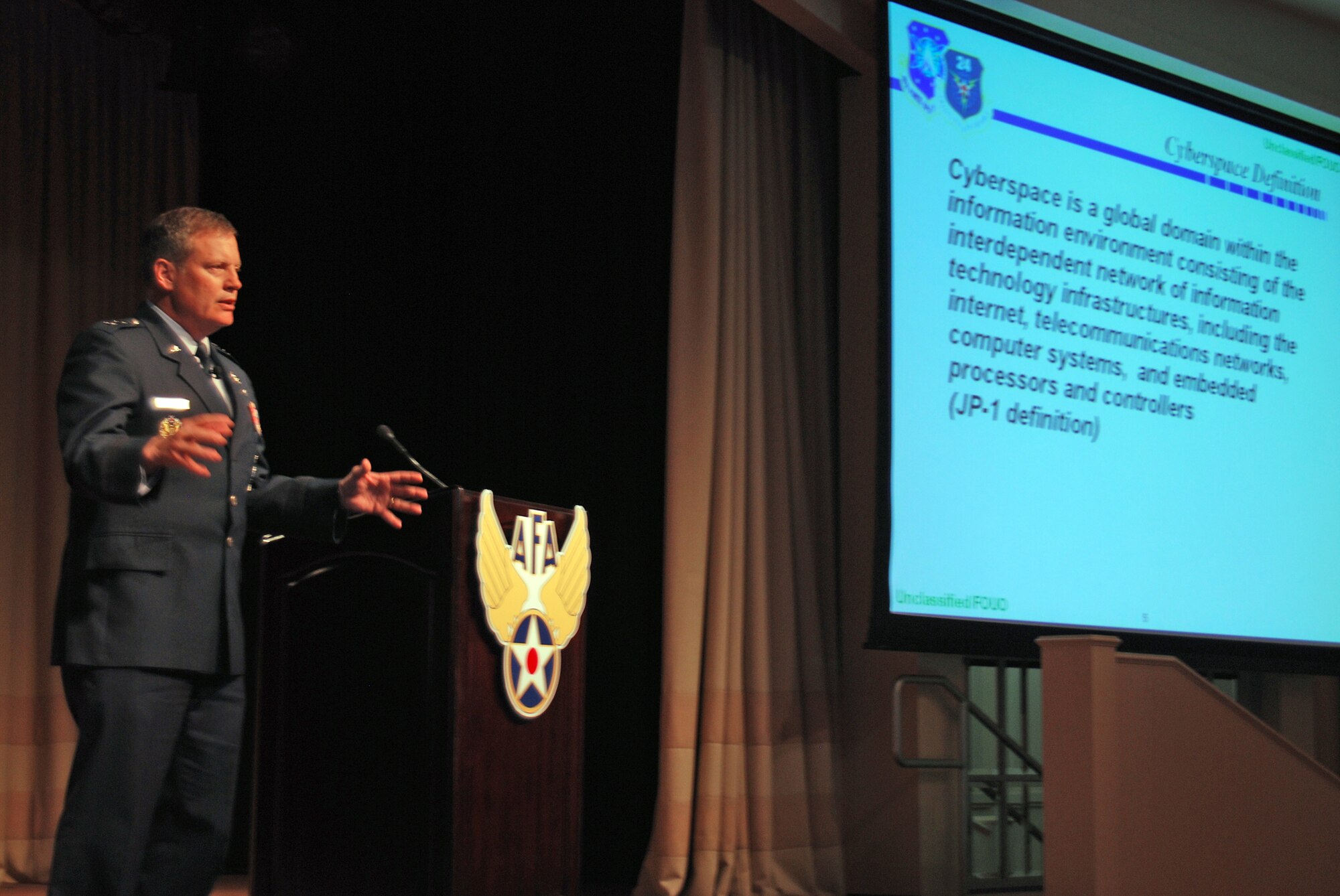 Maj. Gen. Richard E. Webber discusses the Air Force's cyberspace mission at the 2009 Air Force Association Global Warfare Symposium Nov. 19, 2009, in Los Angeles. Senior leaders addressed such issues as space, cyberspace and deterrence to Airmen, civilians and industry partners. General Webber is the 24th Air Force commander. (U.S Air Force photo/Tech. Sgt. Amaani Lyle)