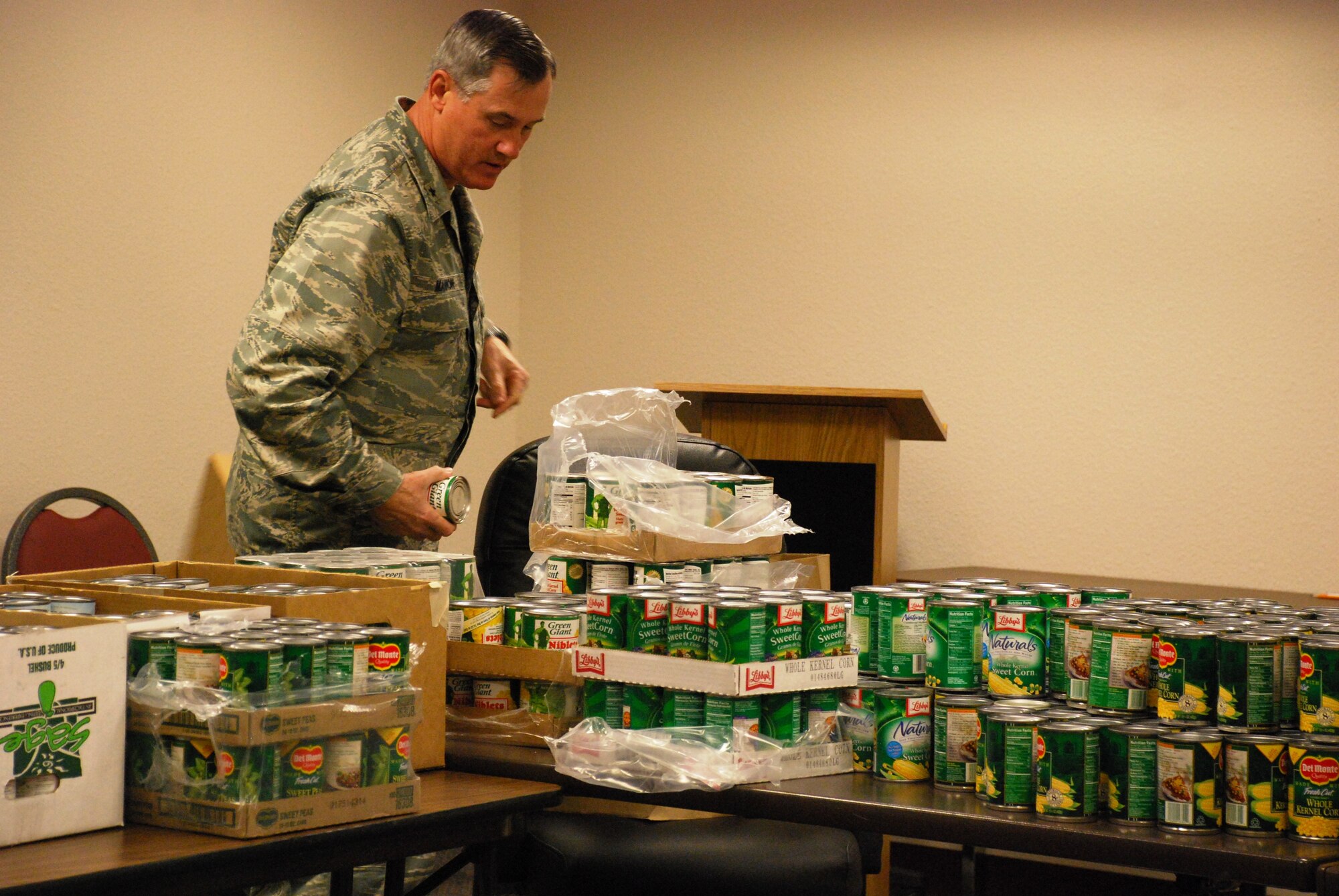 Brig. Gen. O.G. Mannon, 82nd Training Wing commander, helps members of the Airman and Family Readiness Center prepare more than 200 food baskets that will be given to Airmen in need for the upcoming holiday season. As of Nov. 20 more than 400 pounds of food had been donated with donors ranging from dependents, to retirees to active duty servicemembers from the 82nd TRW and the 80th Flying Training Wing. The 89th Flying Training Squadron, 459 FTS and 80th Operation Support Squadron donated more than 300 pounds of food to help the cause. The last day to donate will be Nov. 24. (U.S. Air Force photo/Airman 1st Class Valerie Hosea)