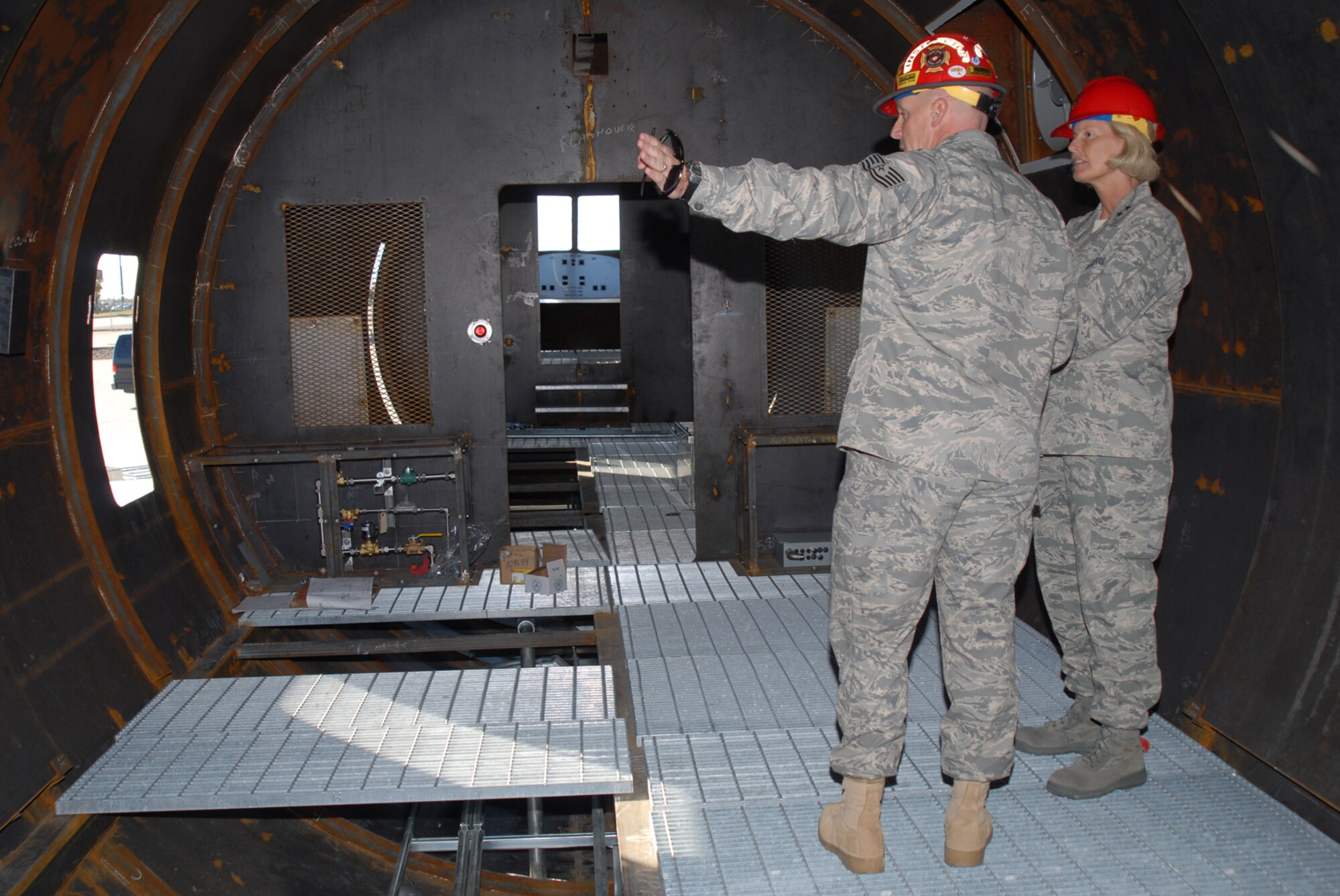 GOODFELLOW AIR FORCE BASE, Texas -- Tech. Sgt. Joel Harr, 312th Training Squadron instructor, provides Maj. Gen. Mary Kay Hertog, 2nd Air Force commander, a tour of the new large frame aircraft trainer, Nov. 19, 2009.  This was General Hertog's first visit to Goodfellow since assuming command of the 2nd Air Force in September. (U.S. Air Force photo/Staff Sgt. Laura R. McFarlane) 
