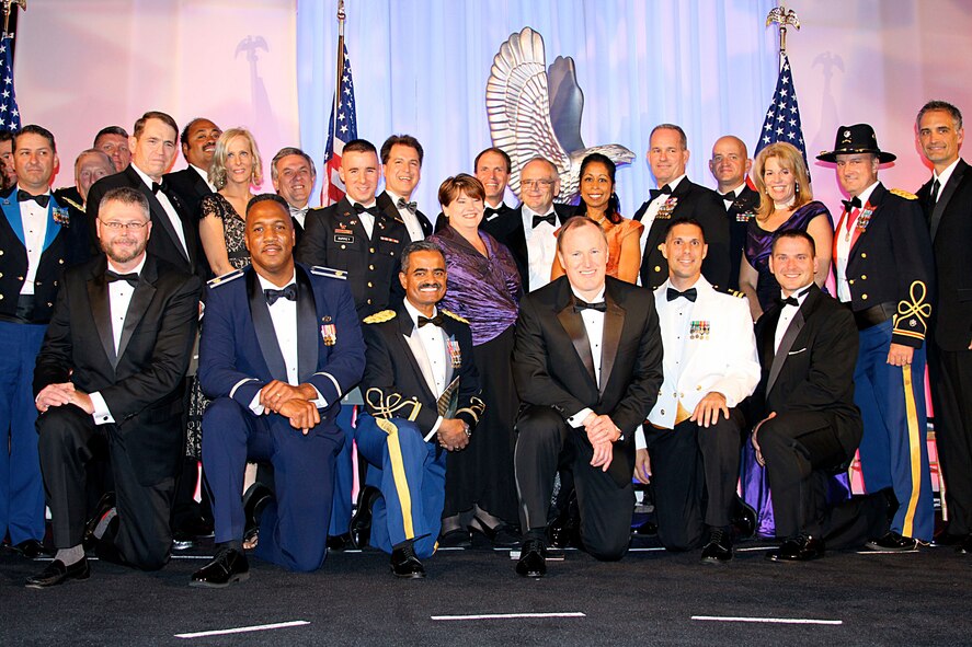 MCCHORD AIR FORCE BASE, Wash., - Maj. Stephen Oliver, second from the left, is a Reservist with the 446th Aircraft Maintenance Squadron and an employee of Microsoft. Microsoft Corporation has been awarded the 2009 Secretary of Defense Employer Support Freedom Award. Major Oliver was one of two Reserve military members who submitted the company for this award, whch is the highest recognition given by the U.S. government to employers who support their Guard and Reserve employees. (Courtesy photo)