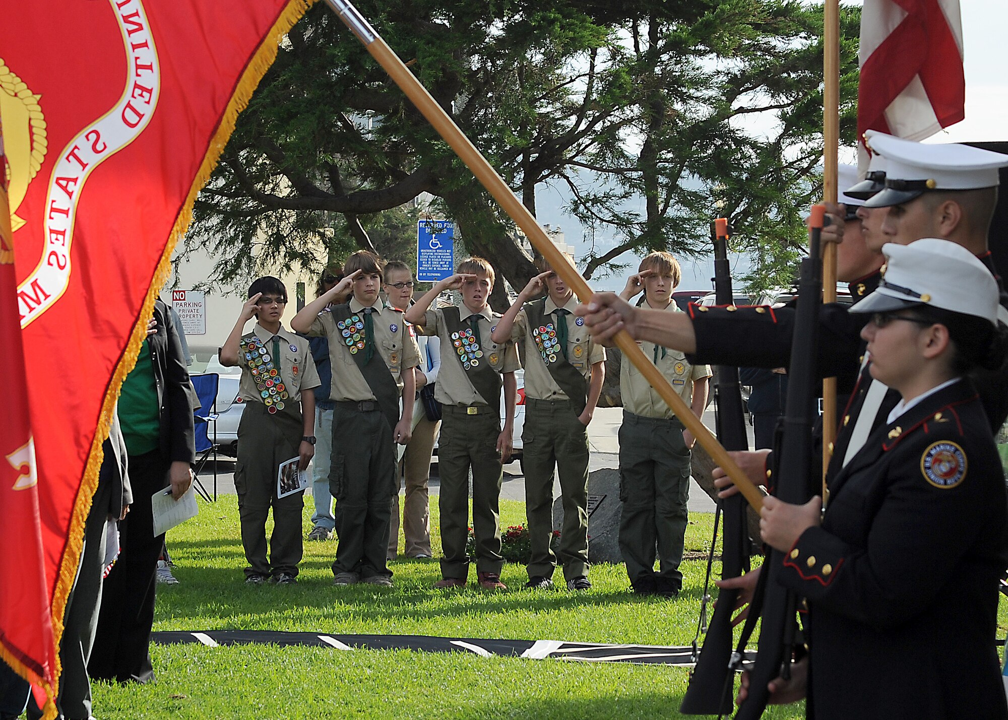 Members from the United States Boy Scout troop 948 pay tribute to the flag during the National Anthem, Nov. 11. Generations from the past, present and future came together during the 7th annual Veterans Day Tribute held by the City of Redondo Beach, Calif., to honor those who served in the U.S. Armed Services. (Photo by Joe Juarez)