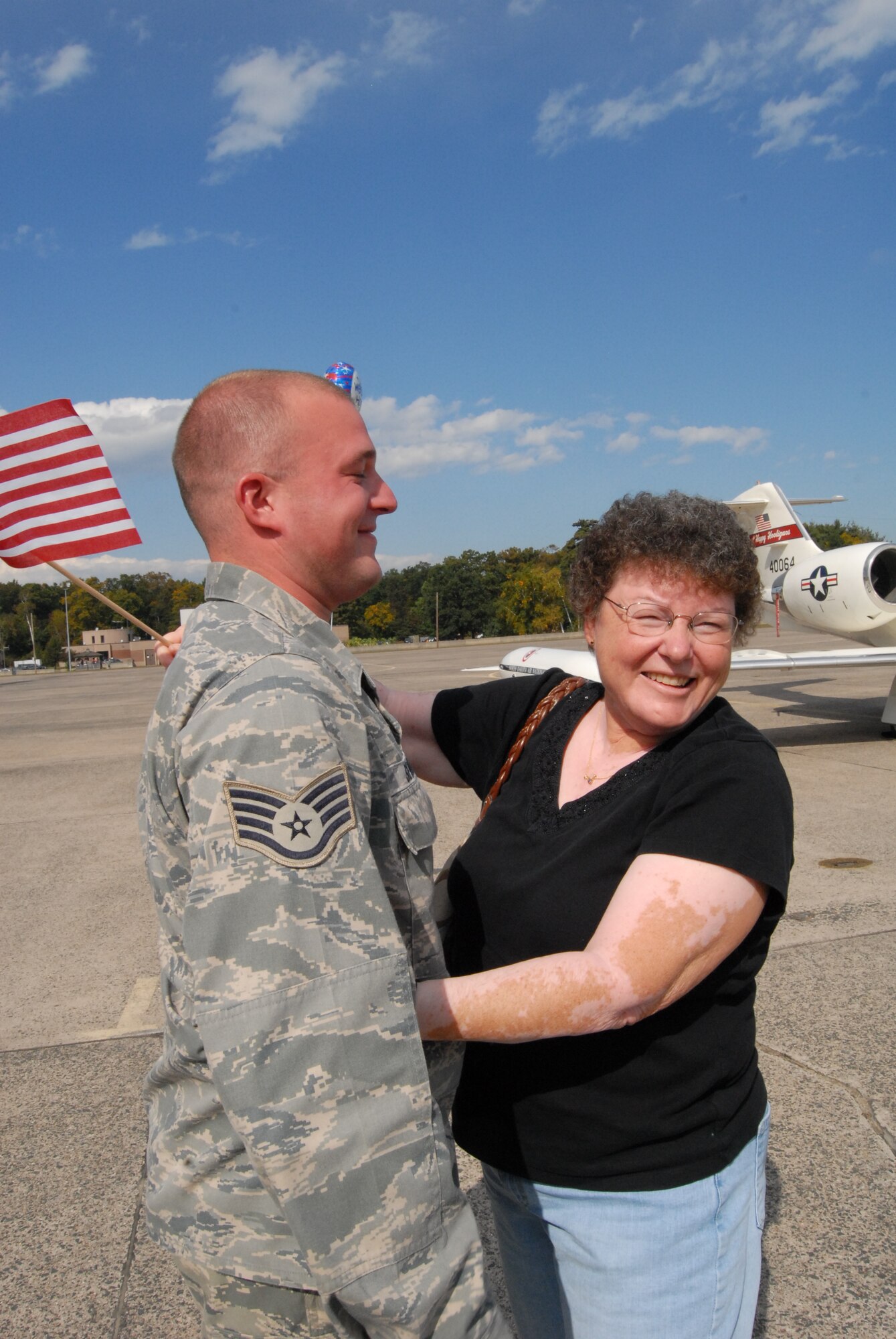 Staff Sgt. Steven Sevigny, 103rd Maintenance Squadron, gets a warm welcome from his mom, Judy Sevigny, on the flightline at Bradley Air National Guard Base , East Granby, Conn. Oct. 4, 2009.  Sevigny had returned home after deployment to Southwest Asia in support of overseas contingency operations.  (U.S. Air Force Photo by Capt. Jefferson S. Heiland)