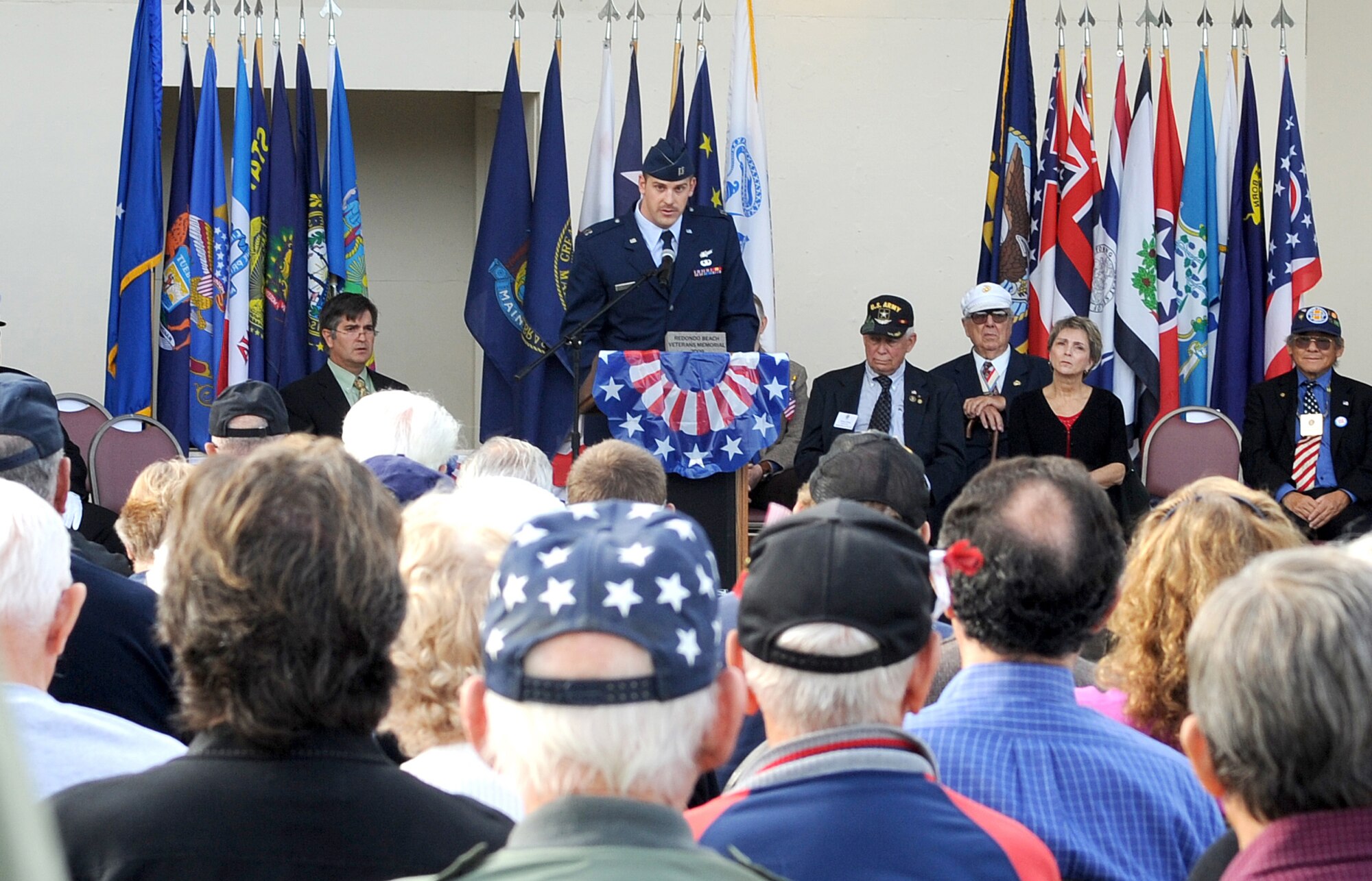 Keynote speaker Capt. Joshua Jewett, Space and Missile Systems Center’s Space Base Infrared Systems Wing, addresses the crowd during the 7th annual Veterans Day Tribute held by the City of Redondo Beach, Calif., Nov. 11. The event honored the veterans and current military personnel of all United States wars. (Photo by Joe Juarez)
