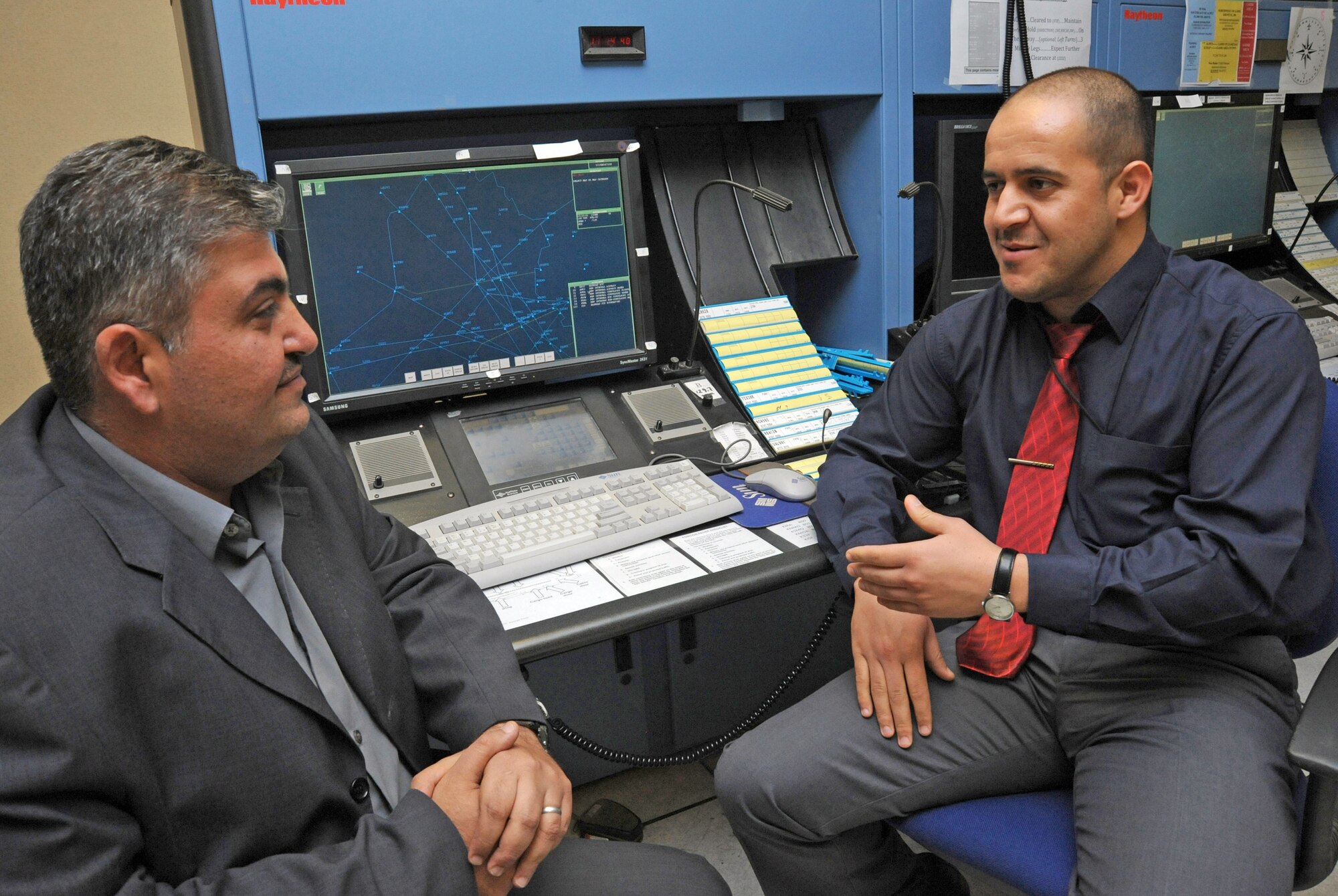 Iraqi Civil Aviation Authority members discuss the new airway structure Nov. 18, 2009. Air Force members spent seven months assisting the Iraqis with developing new air routes. These routes will increase efficiency and capacity through Iraqi airspace allowing the country to normalize airspace and increase air traffic. (U.S. Air Force photo/Tech. Sgt. Johnny L. Saldivar)