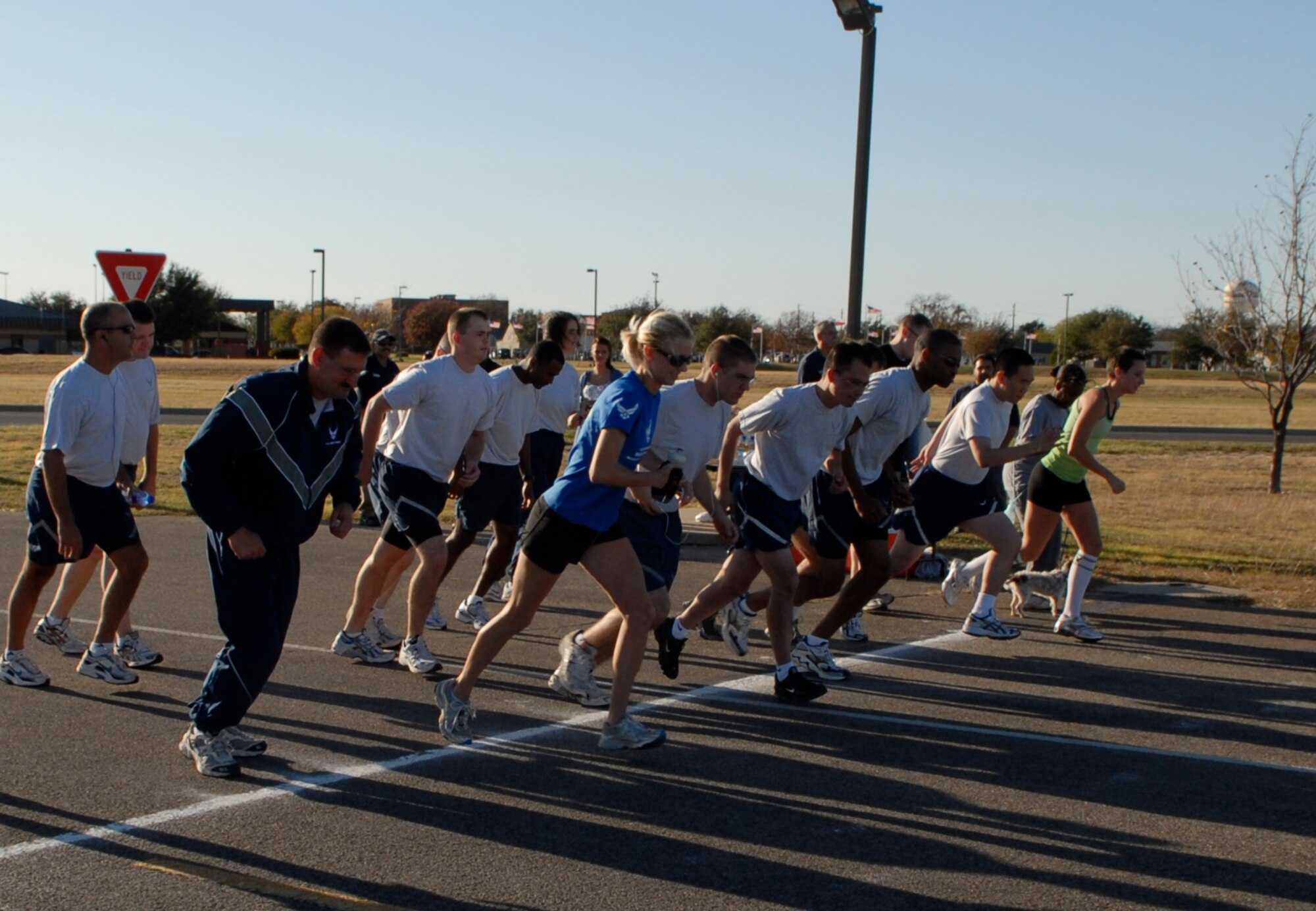 GOODFELLOW AIR FORCE BASE, Texas -- Servicemembers from Goodfellow AFB set off on the 2009 Turkey Trot, Nov. 18. The 5 kilometer course is set at the "triangle" on the old flightline. (U.S. Air Force photo/Lou Czarnecki)