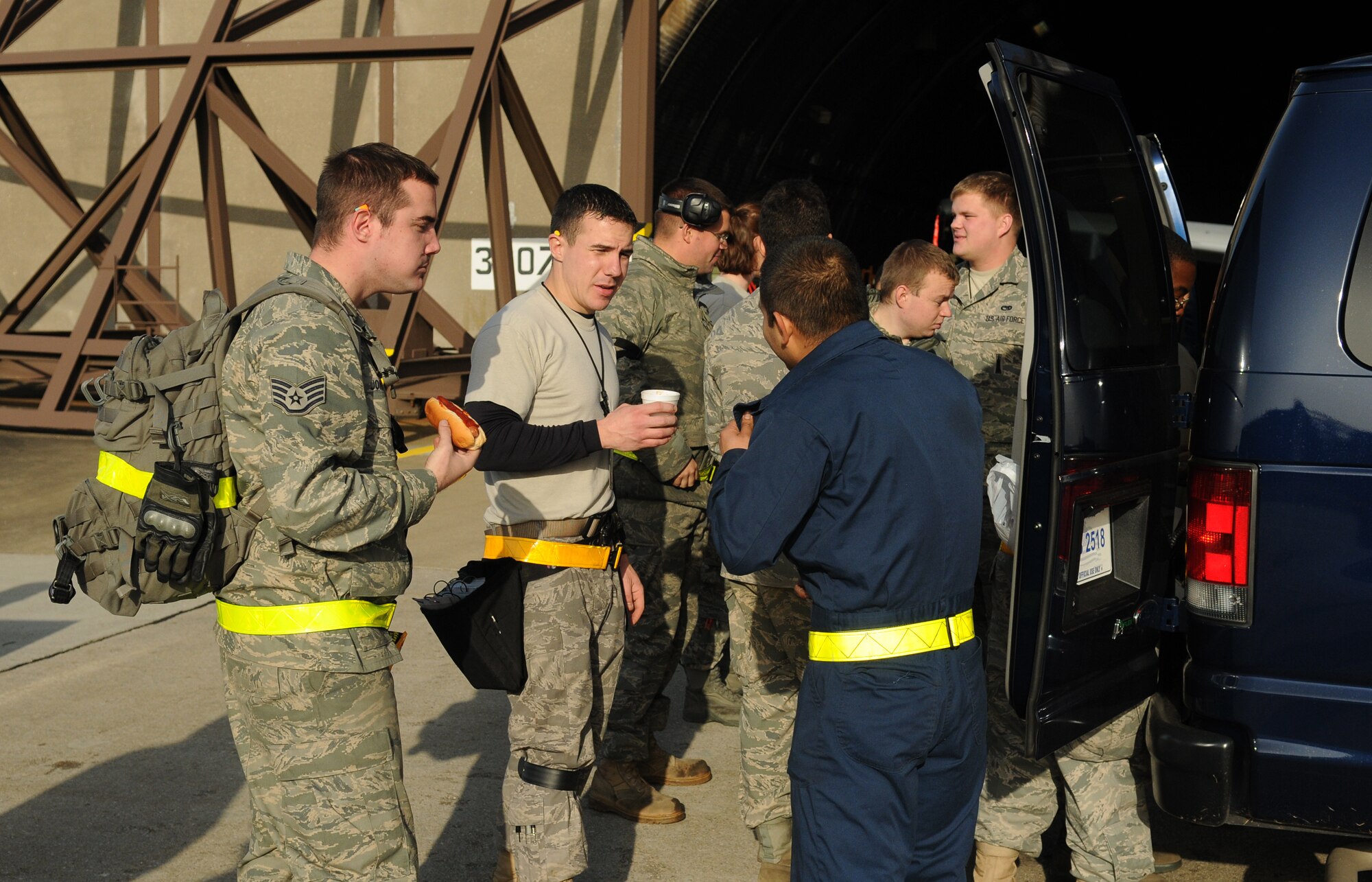 SPANGDAHLEM AIR BASE, Germany -- Members of the 52nd Aircraft Maintenance Squadron take a break from working to enjoy a quick snack provided by the first sergeants  Nov. 20 here. These senior enlisted provided Airmen on the flightline food and coffee throughout the exercise. (U.S. Air Force photo/Airman 1st Class Nathanael Callon)