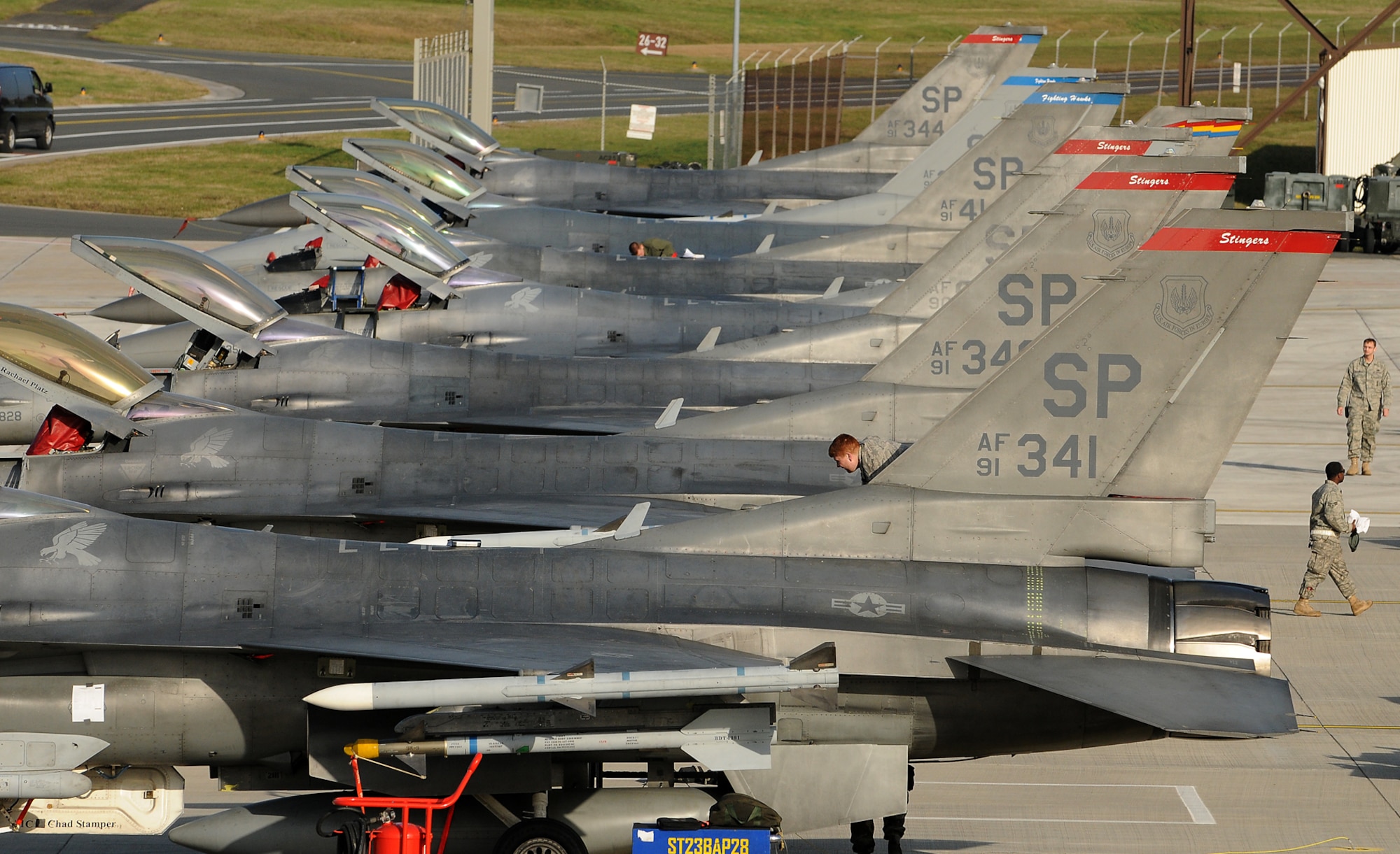 SPANGDAHLEM AIR BASE, Germany -- F-16 Fighting Falcons from the 22nd Fighter Squadron line a ramp on the flightline Nov. 20 here. The 22nd and 81st Fighter Squadrons participated in the Phase I exercise that tested the 52nd Fighter Wing’s capabilities to operate during a real-world contingency. (U.S. Air Force photo/Airman 1st Class Nathanael Callon)