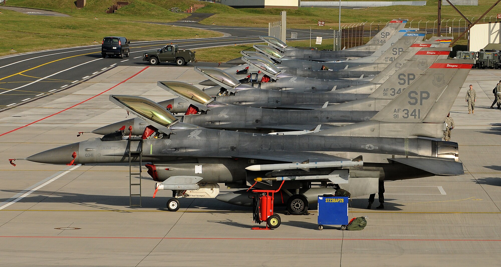 SPANGDAHLEM AIR BASE, Germany -- F-16 Fighting Falcons from the 22nd Fighter Squadron line a ramp Nov. 20 here. The 22nd and 81st Fighter Squadrons participated in Operation Saber Crown 10-02, which tested the 52nd Fighter Wing’s capabilities to operate during a real-world contingency. (U.S. Air Force photo/Airman 1st Class Nathanael Callon)